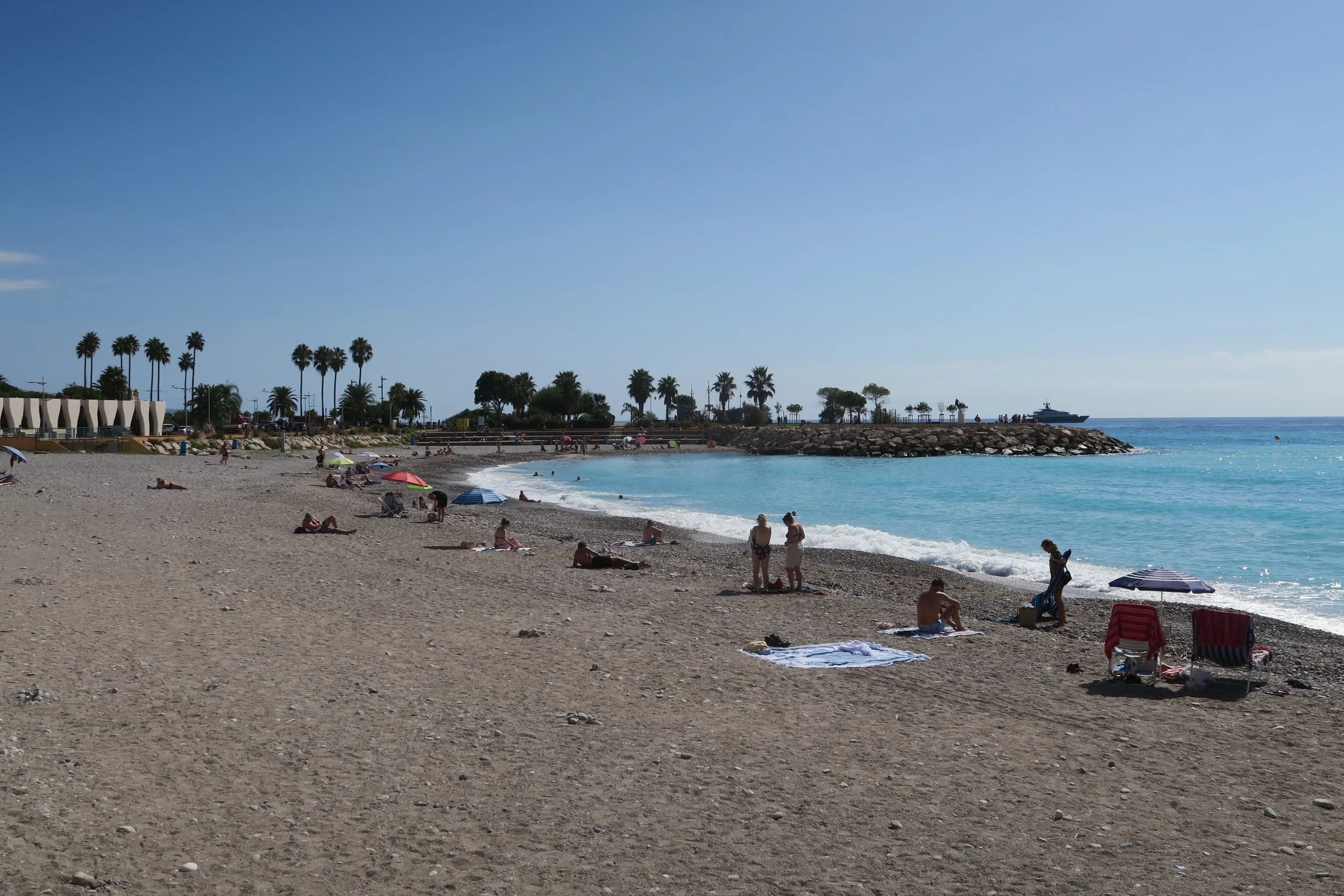 sandy beach with blue skies on french riviera