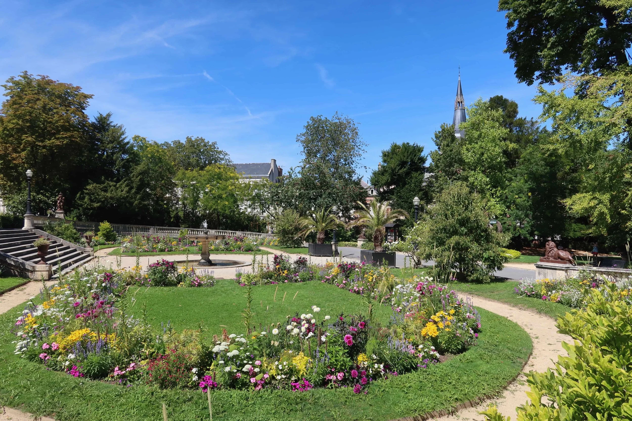 manicured garden with view of church