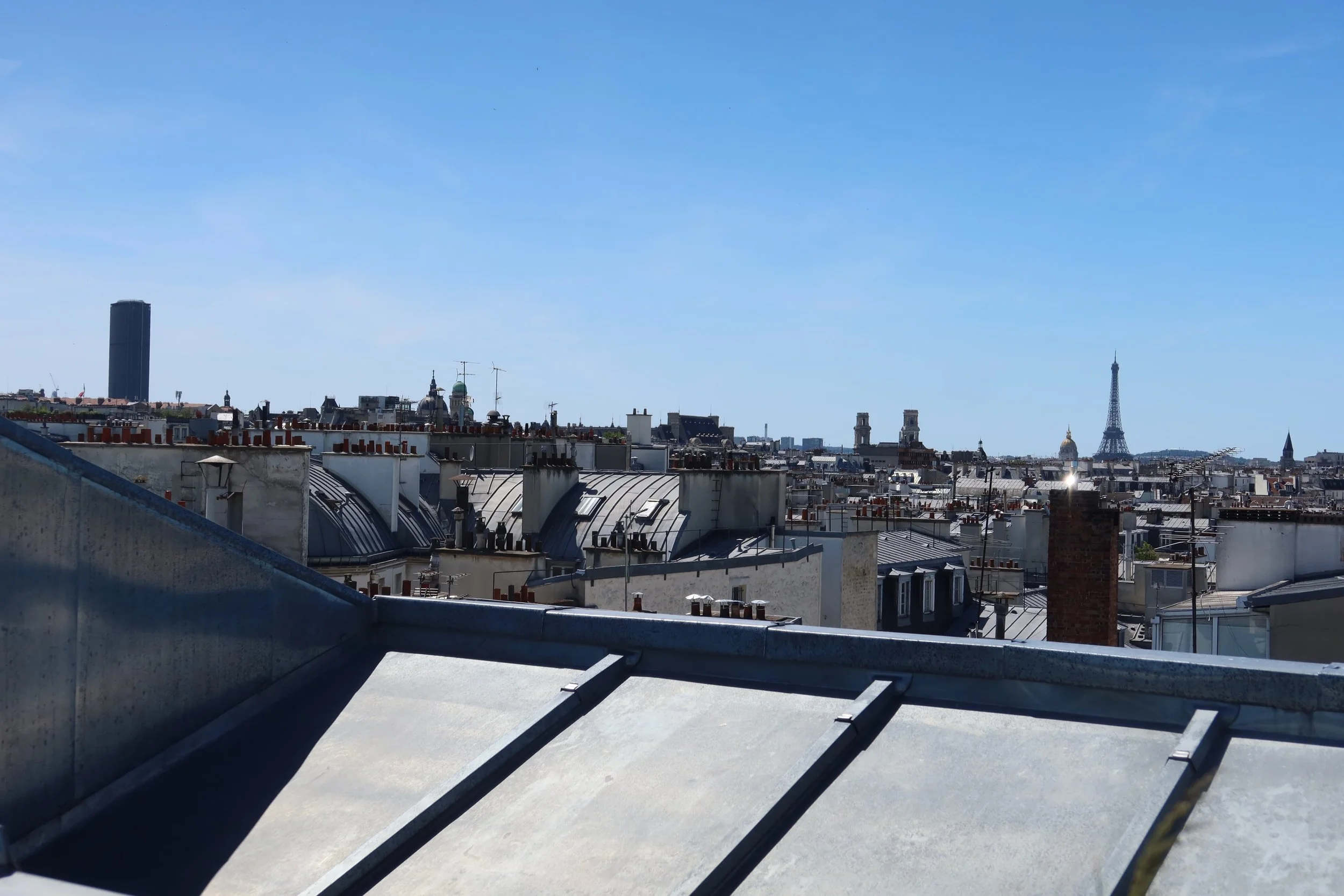 toit de la tour eiffel tower view and rooftops