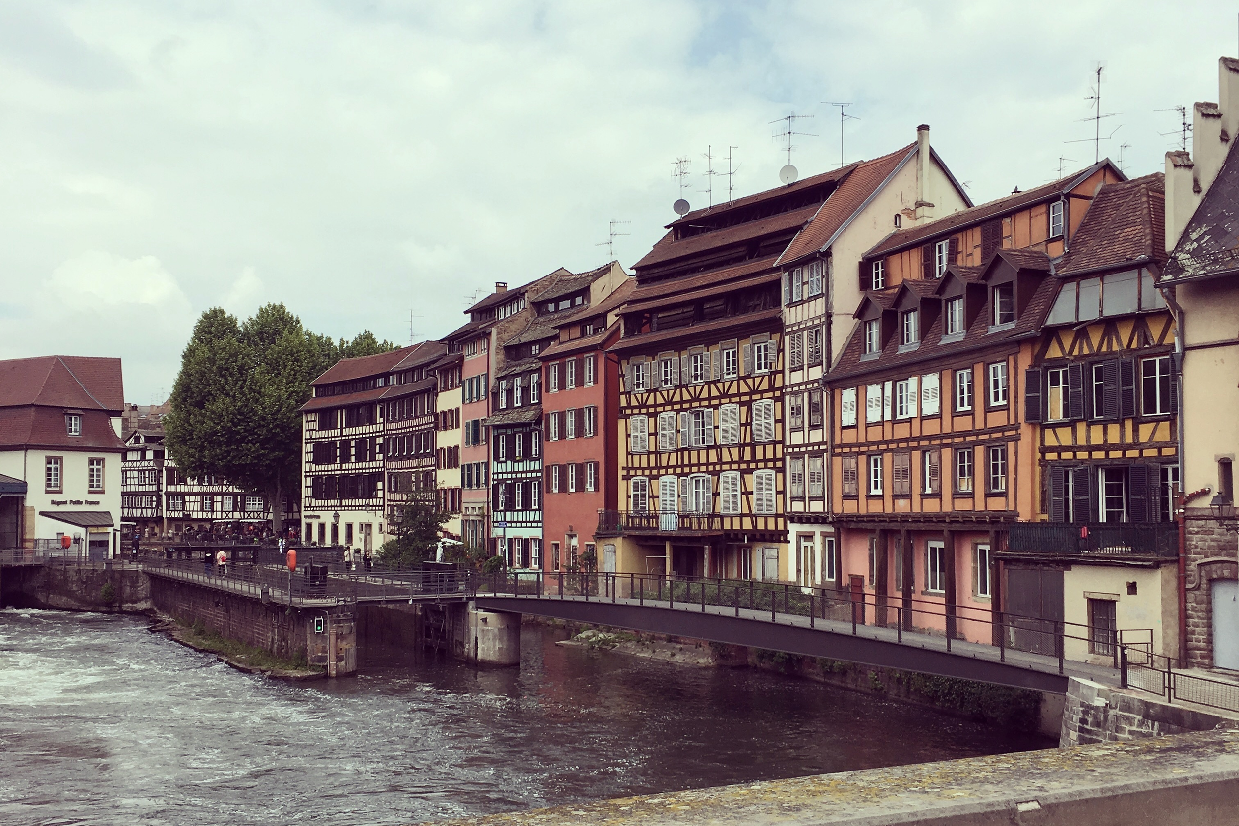 colorful houses strasbourg on water