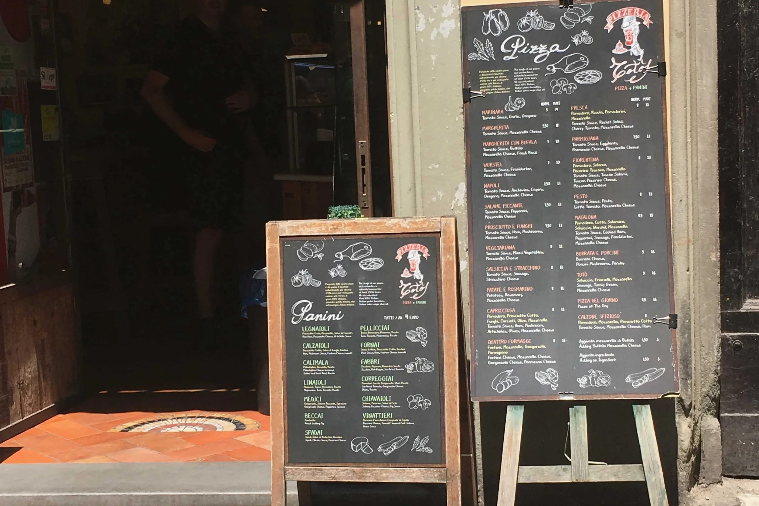 black menus on street in italian
