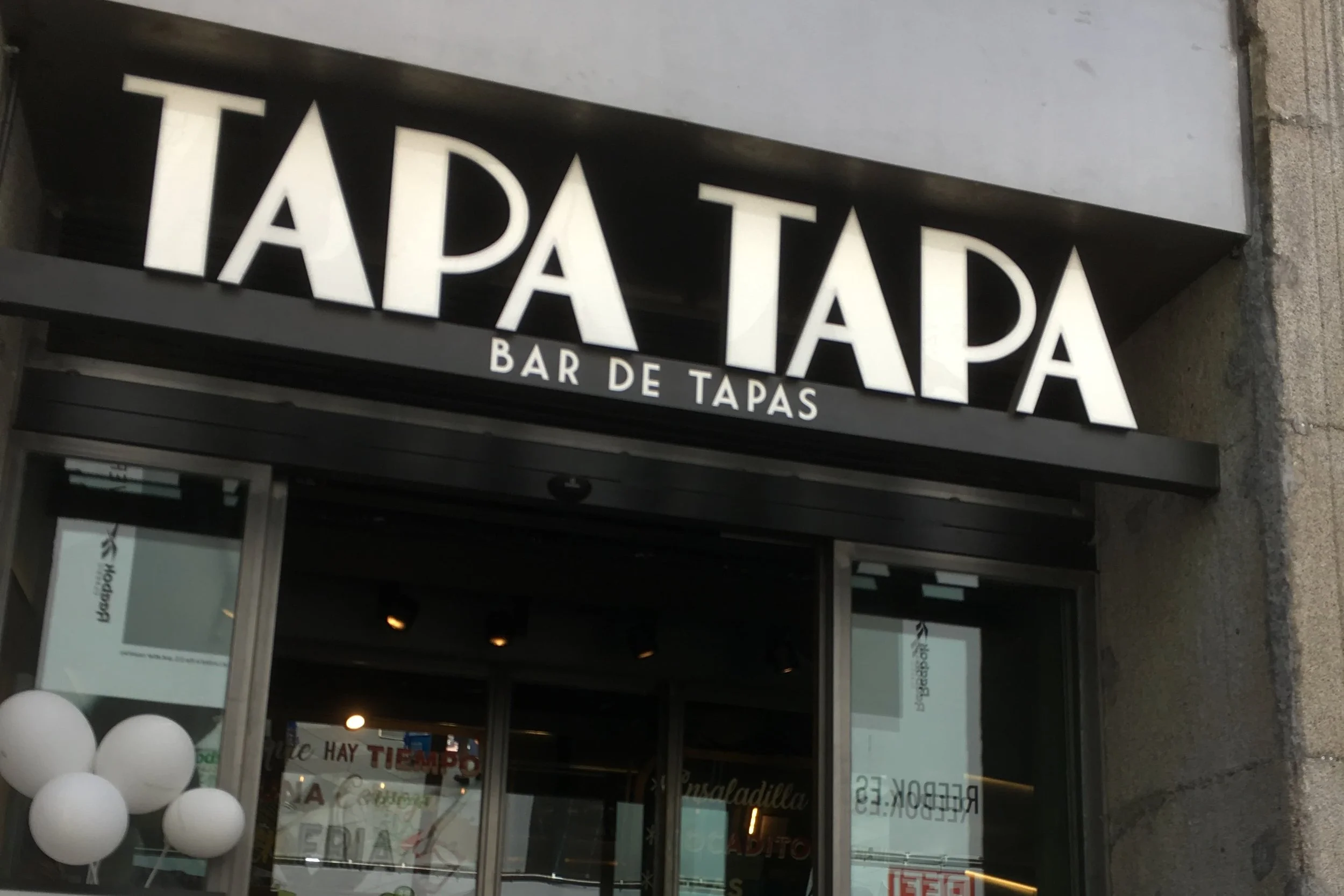 tapa tapa madrid black and white exterior
