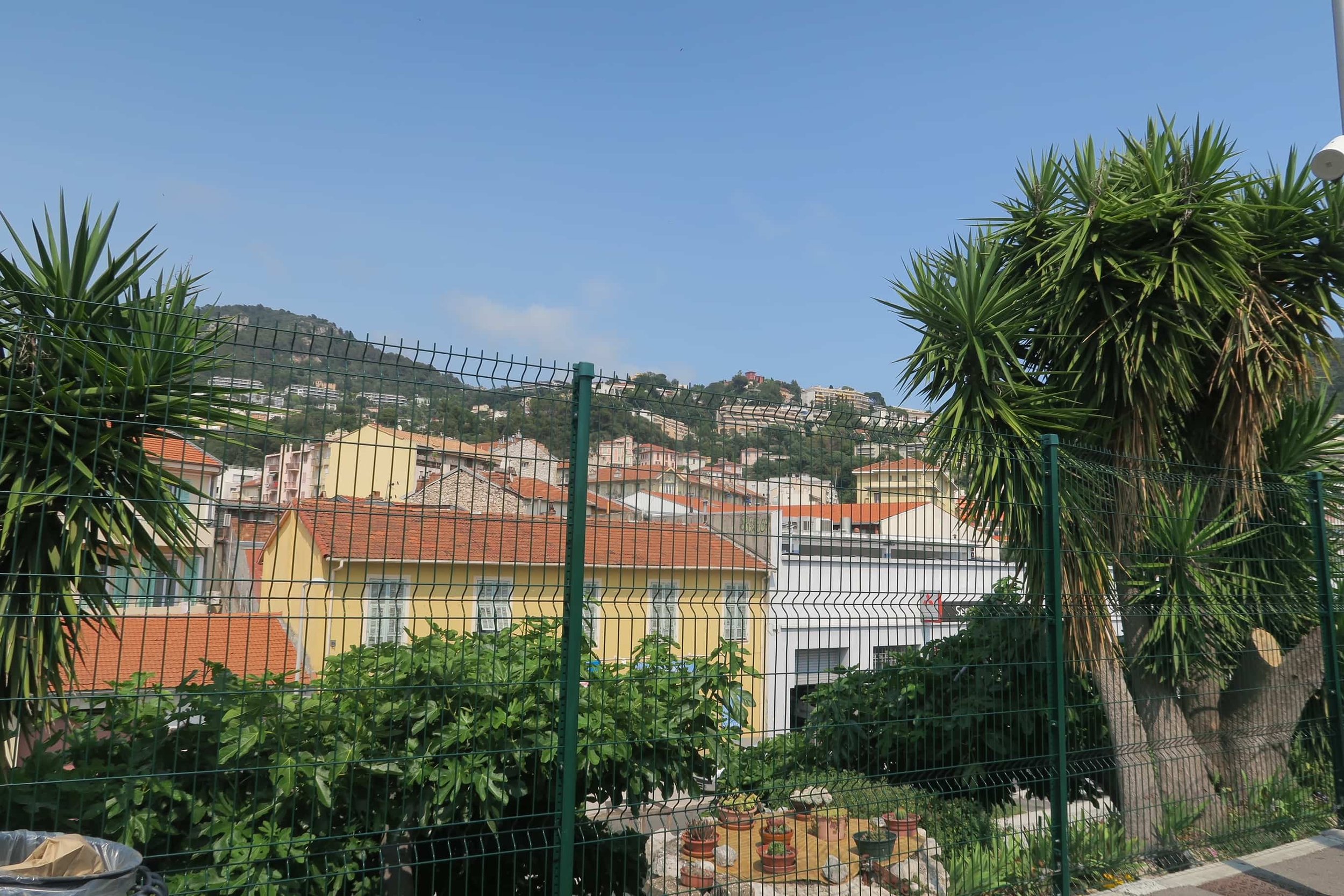 view of green mountains and houses
