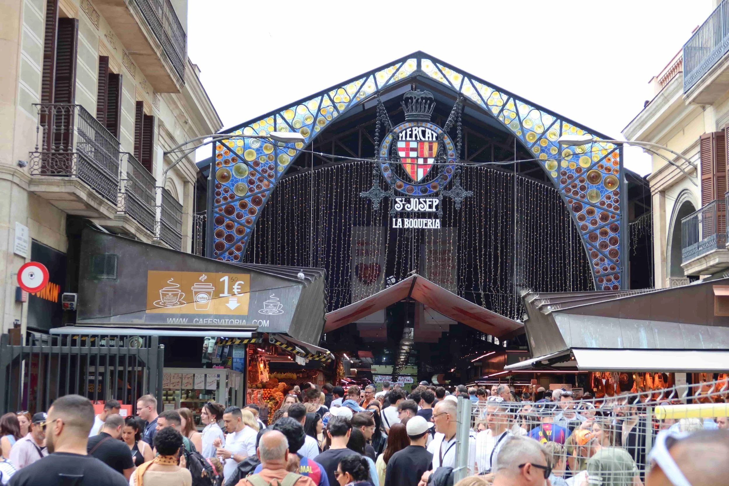 crowded entrance into a food market hall