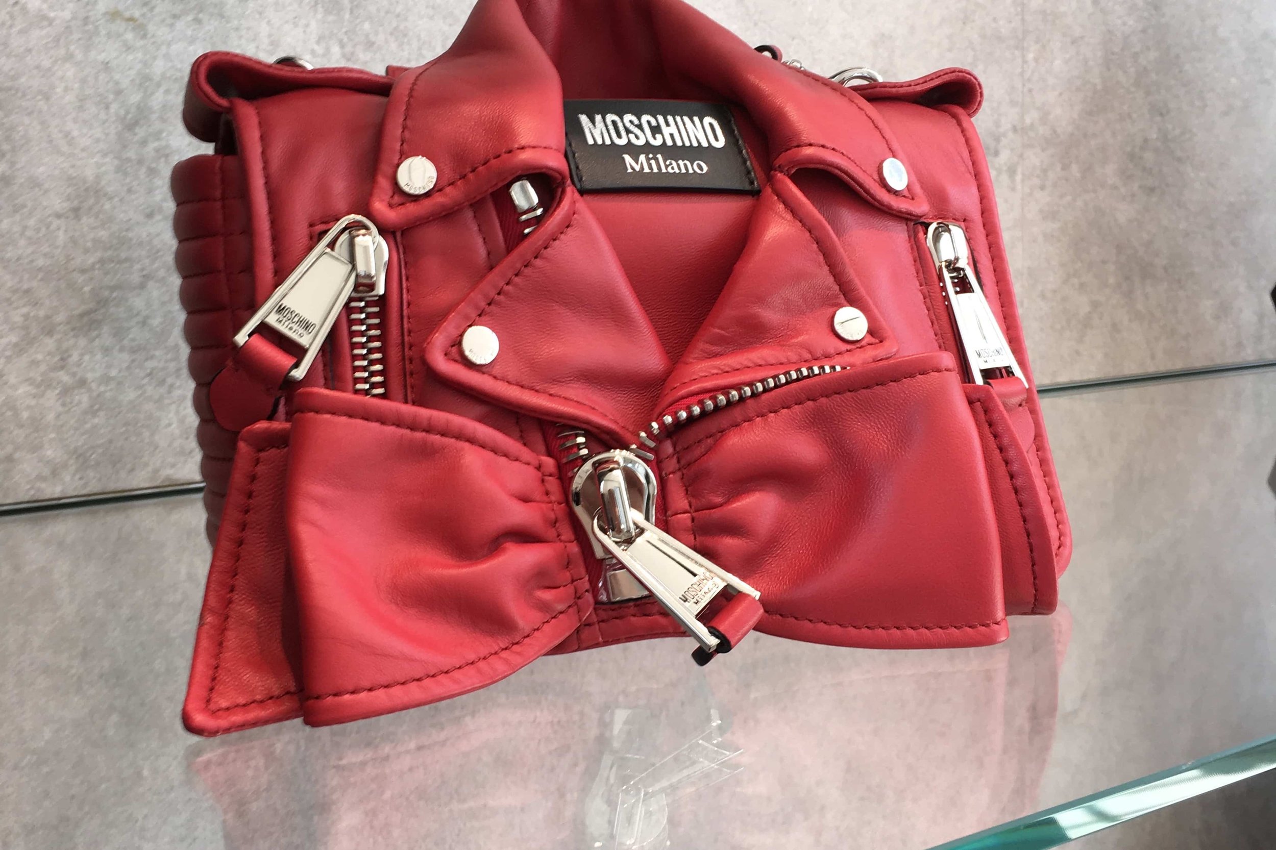 red purse that looks like a jacket