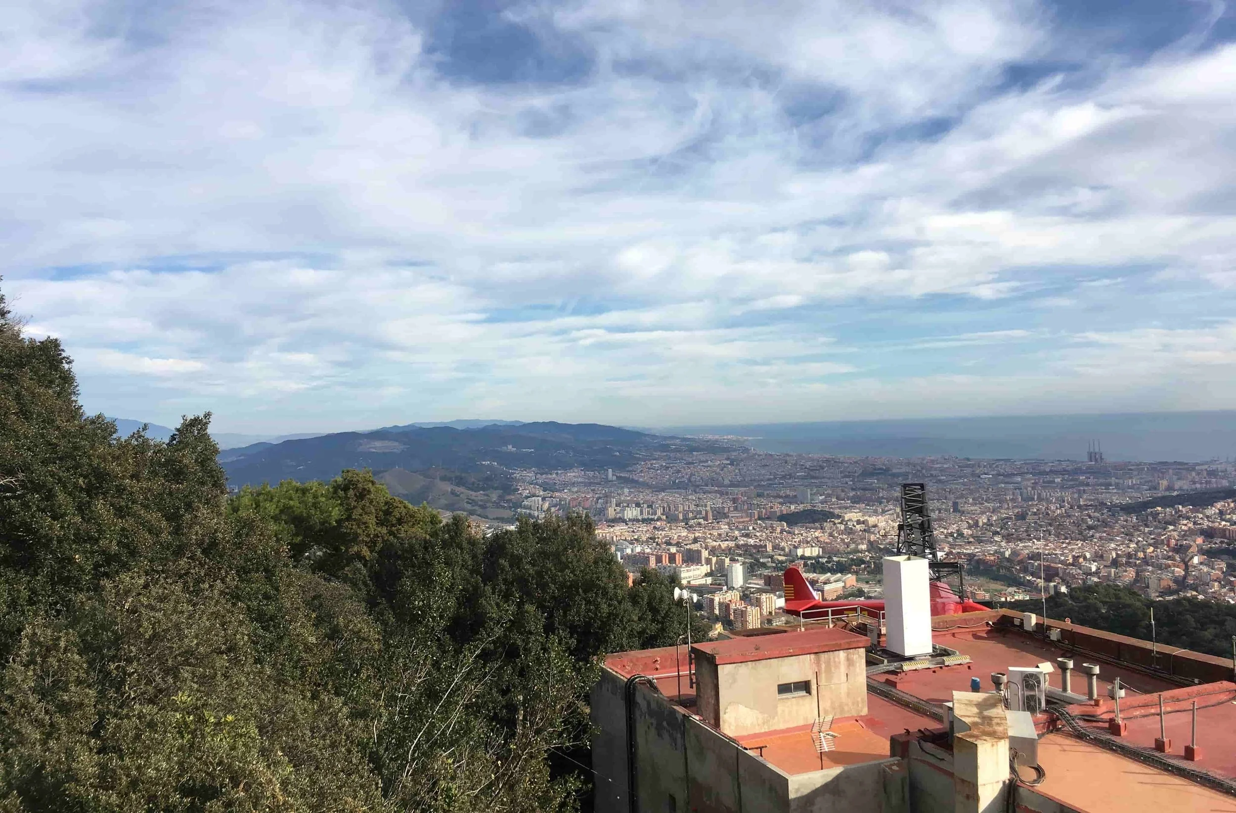 city view of mountains and ocean ahead