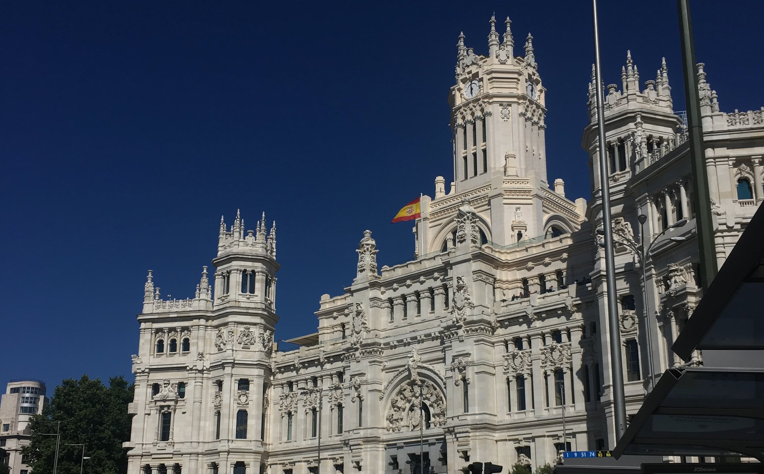dark blue sky and white palace with lots of detail
