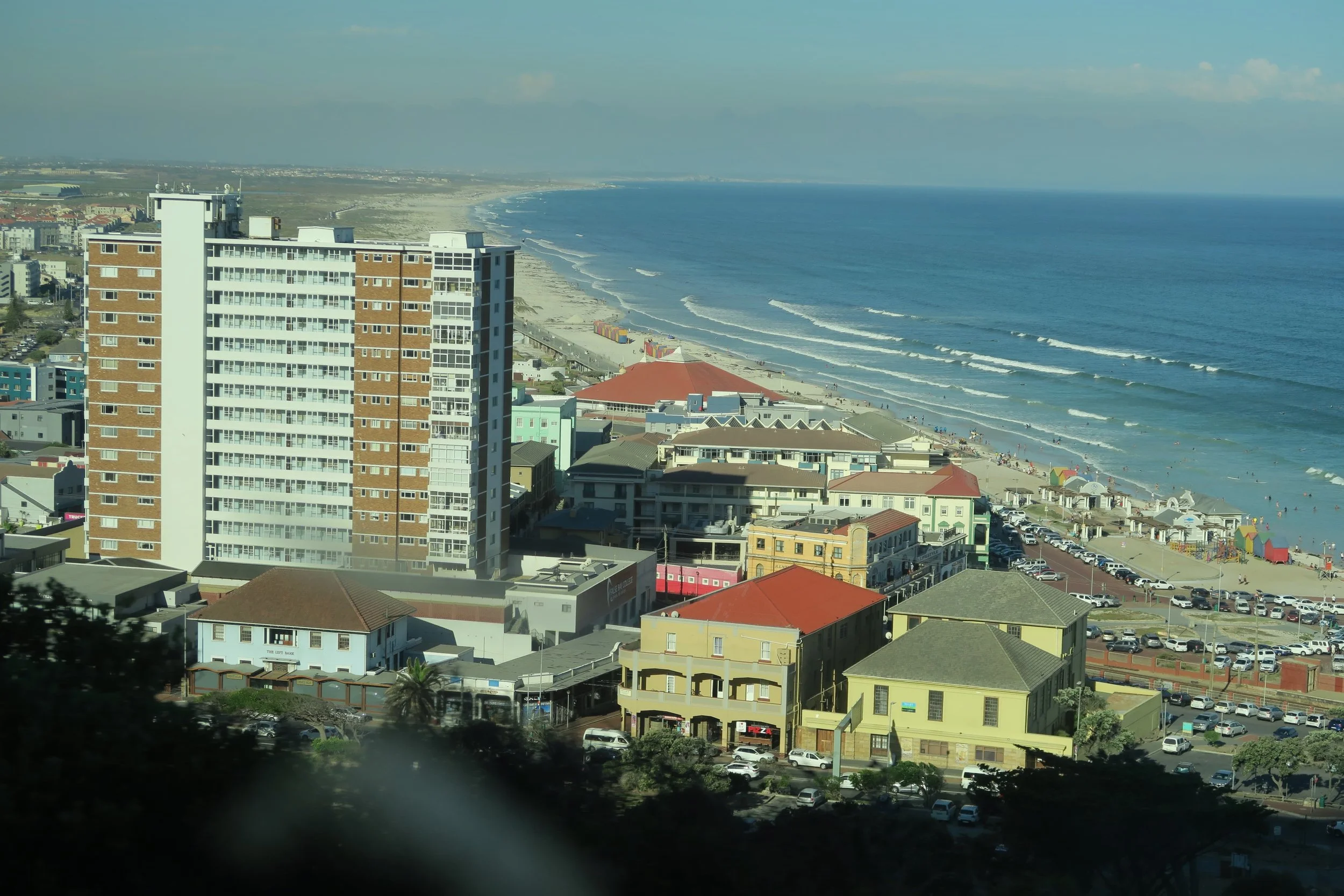 View of Surfer’s Corner and Muizenberg Beach in Cape Town, South Africa