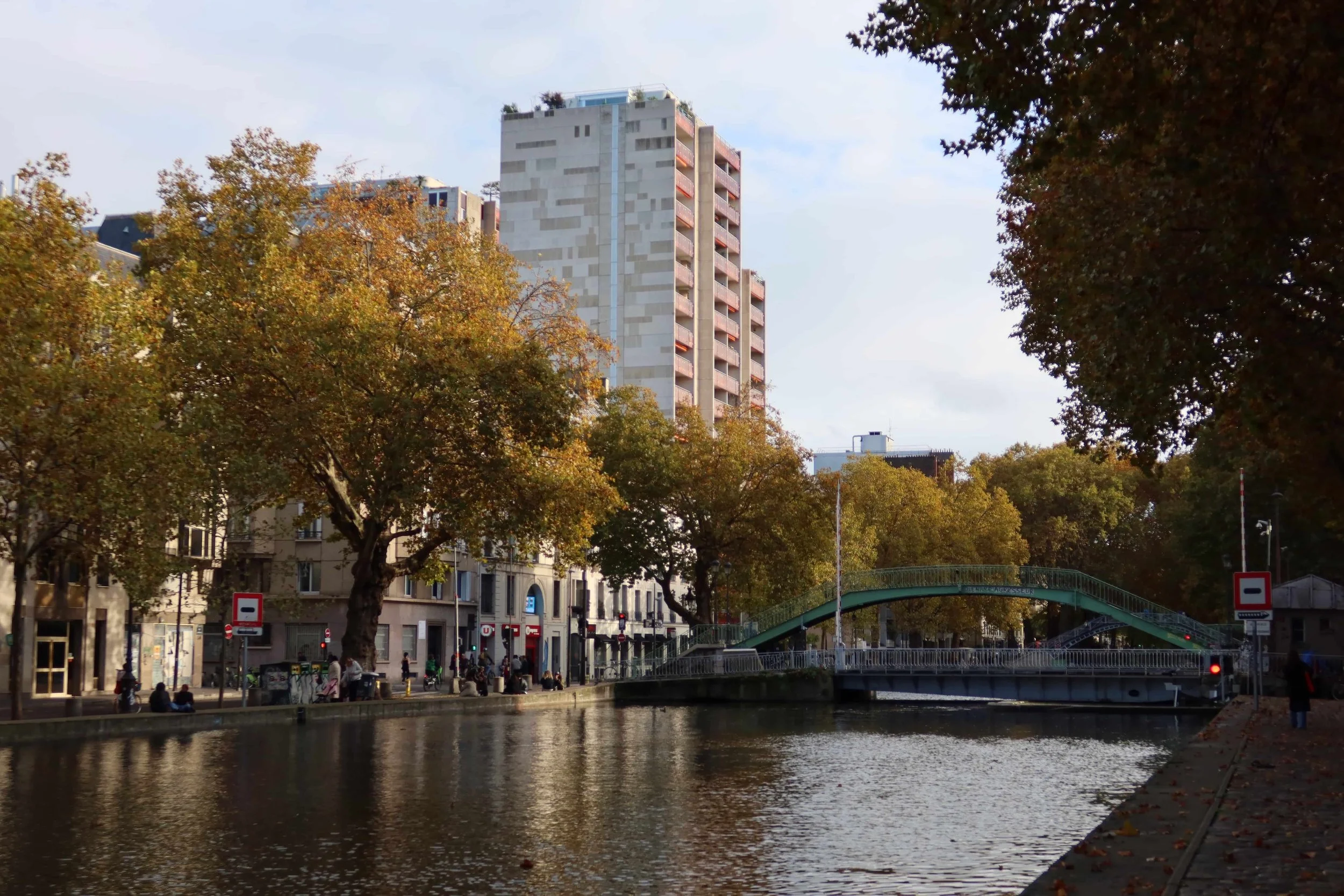 youthful area in paris with water and bridges golden trees