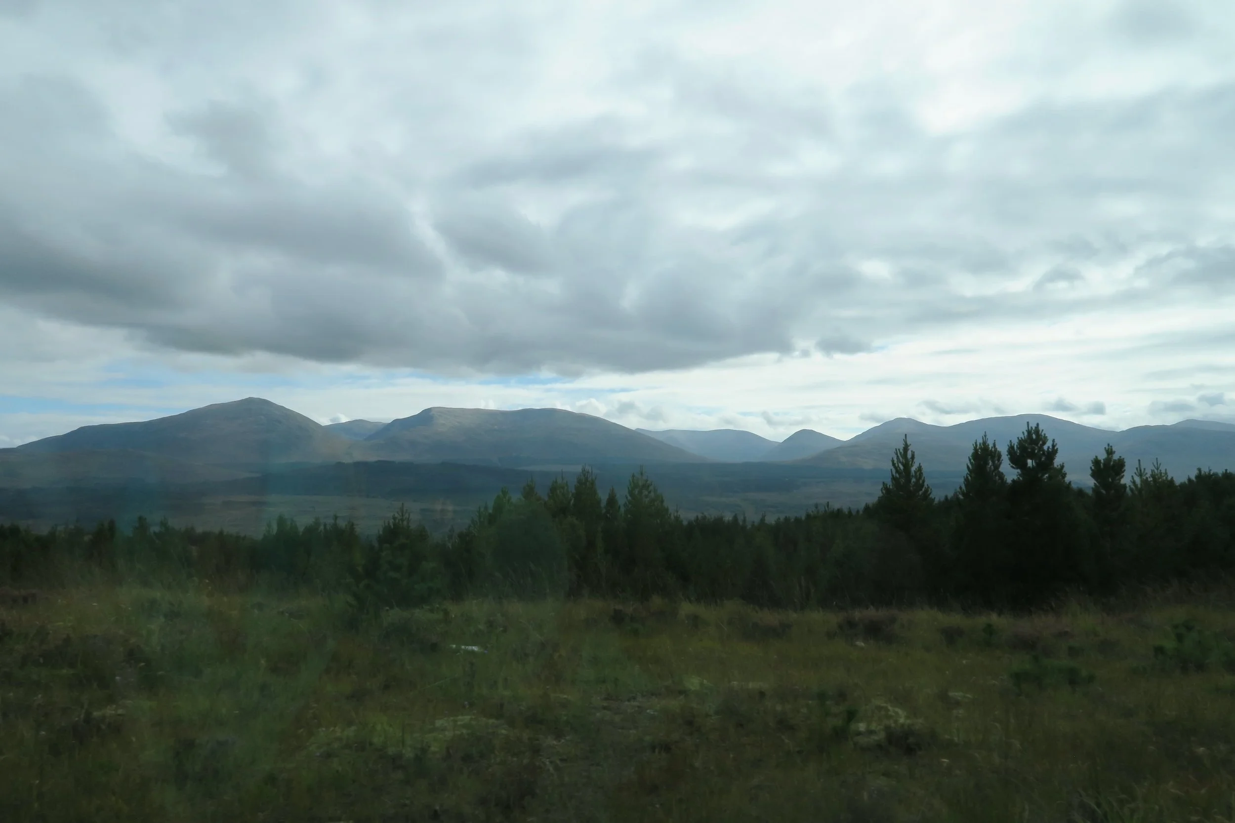 Driving through the varied terrain on the Isle of Skye in Scotland;