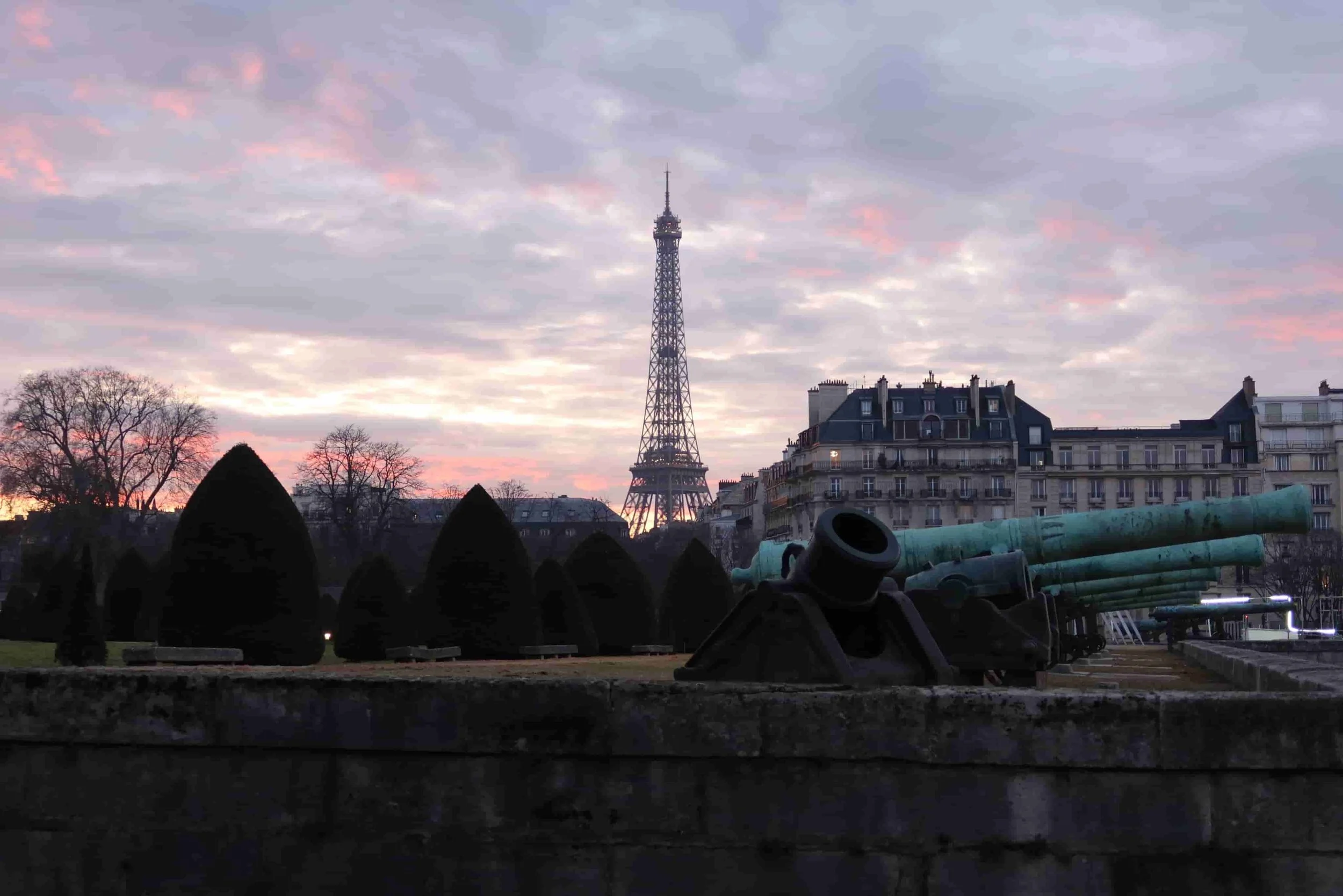 sunset pink clouds with view of eiffel tower