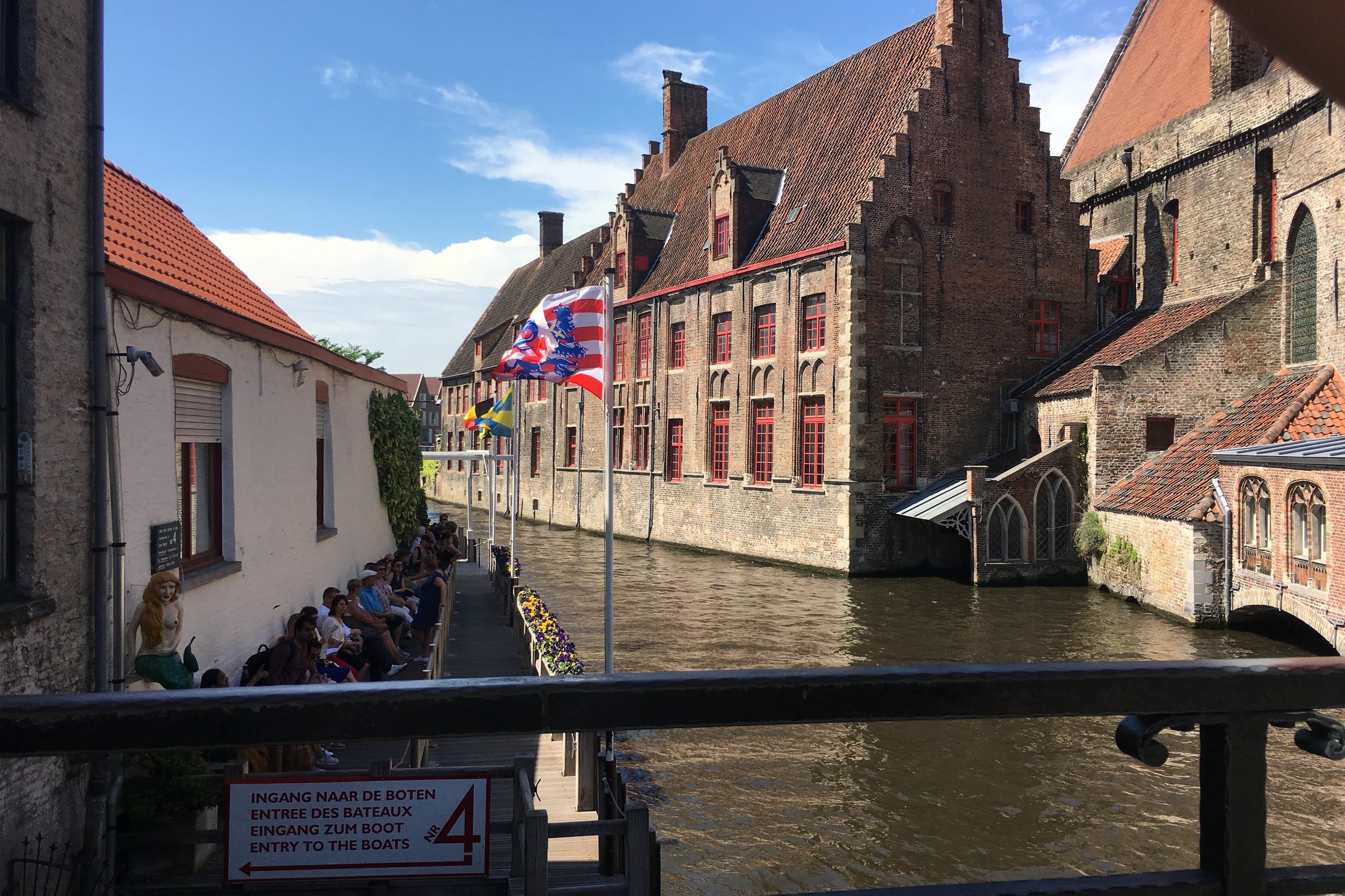 medieval view of bruge and brown lake