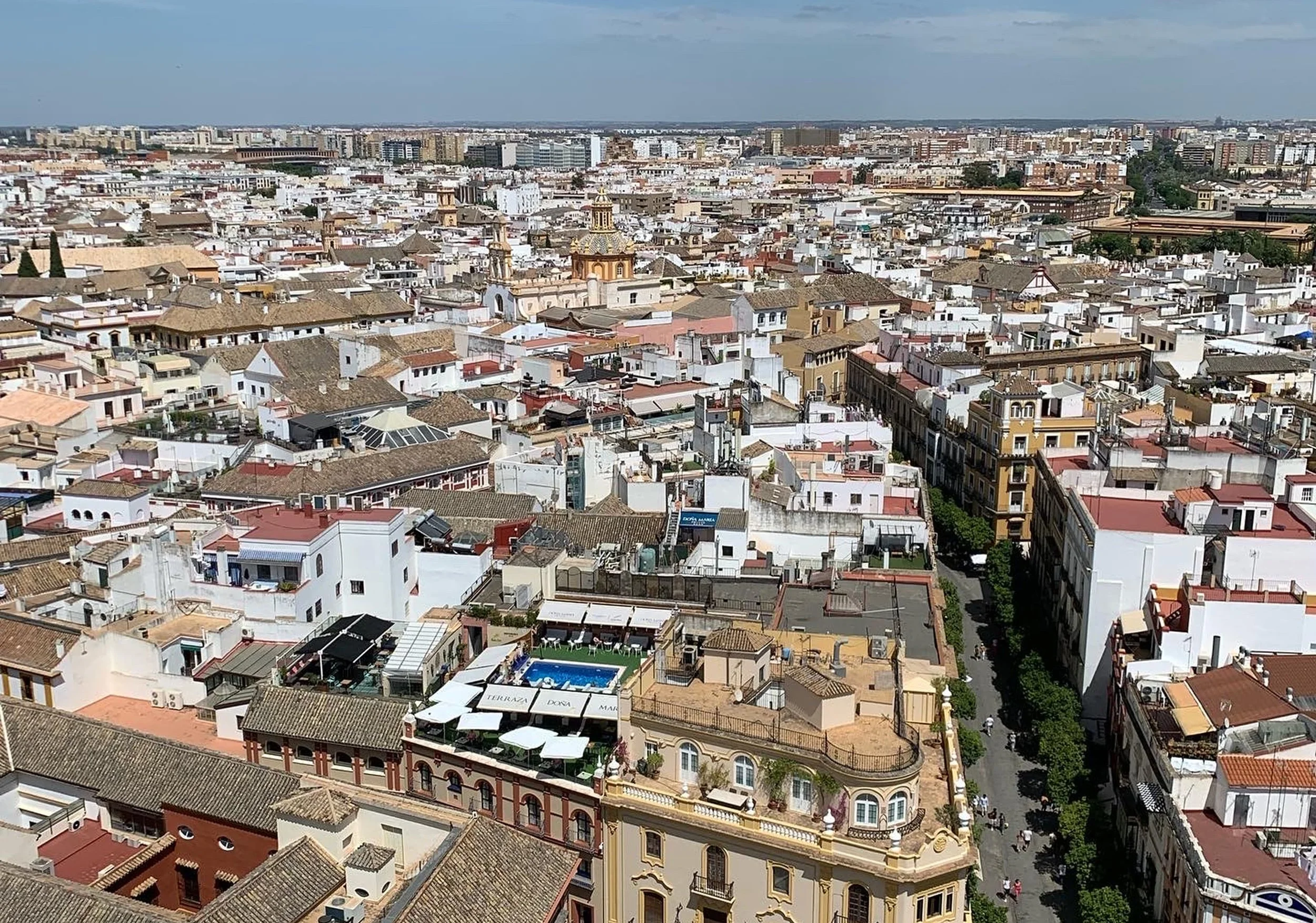 city view of seville from la giralda tower old rooftops brown