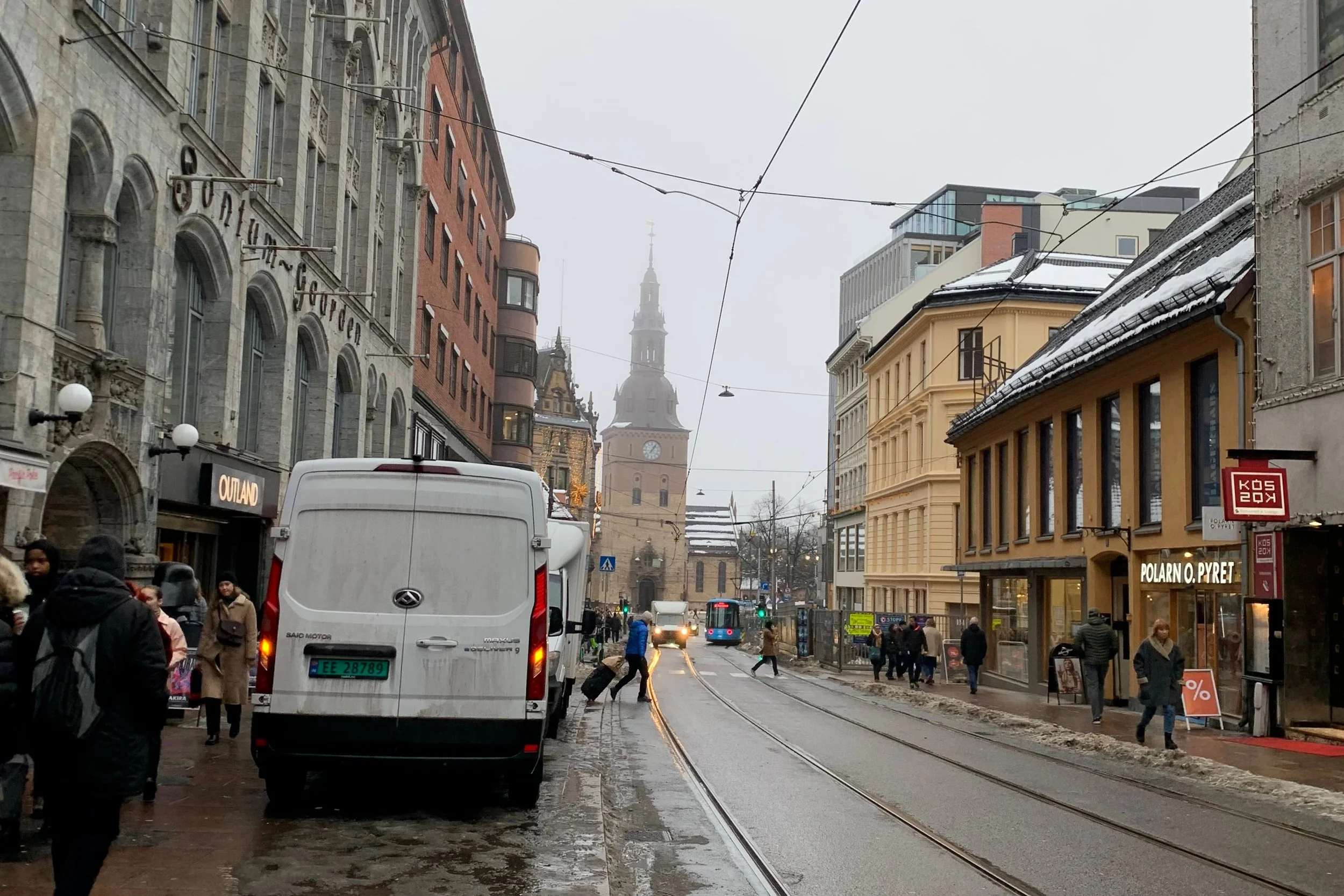 busy street view with clody sky and cathedral