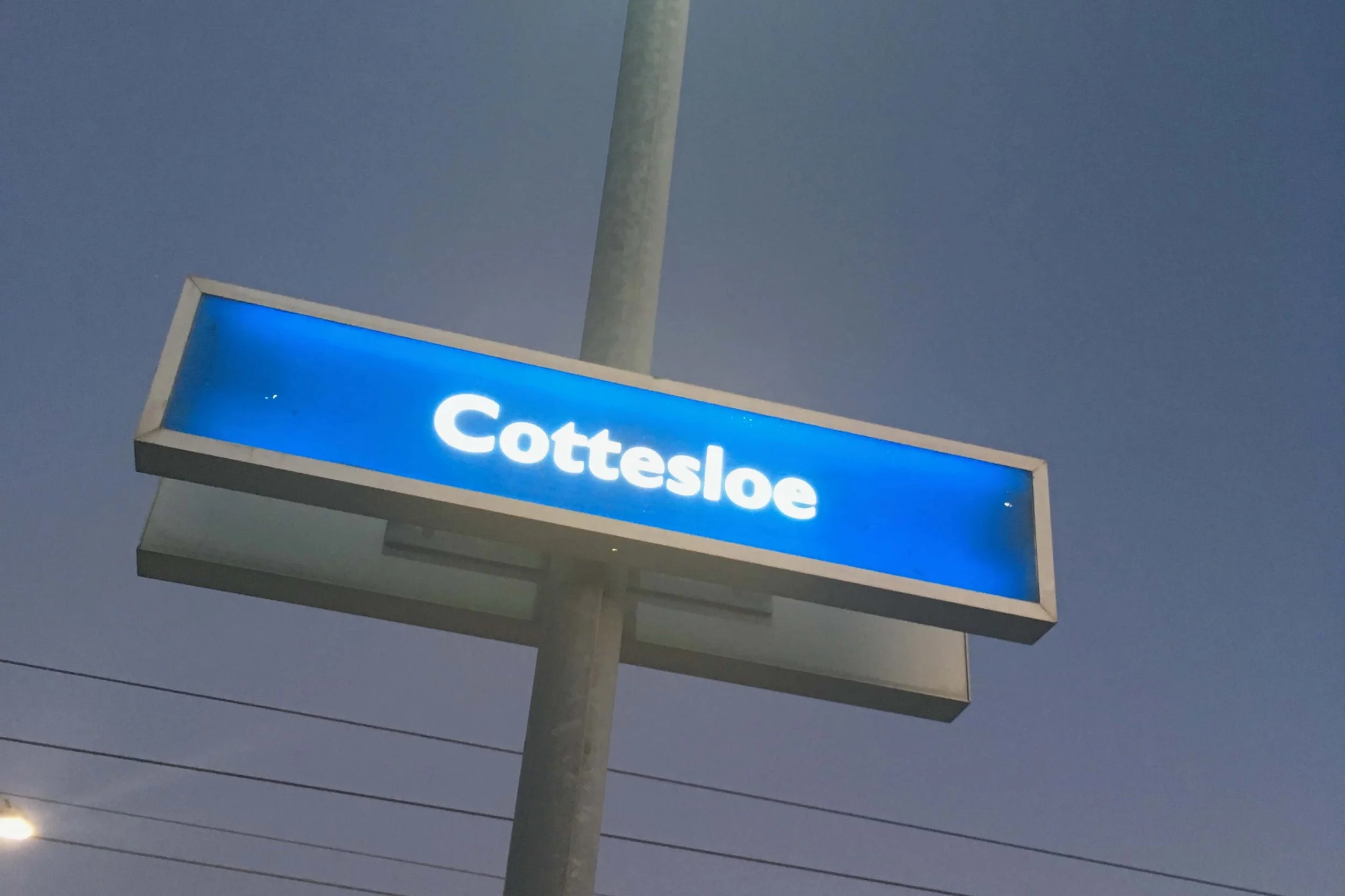 cottesloe beach metro sign blue