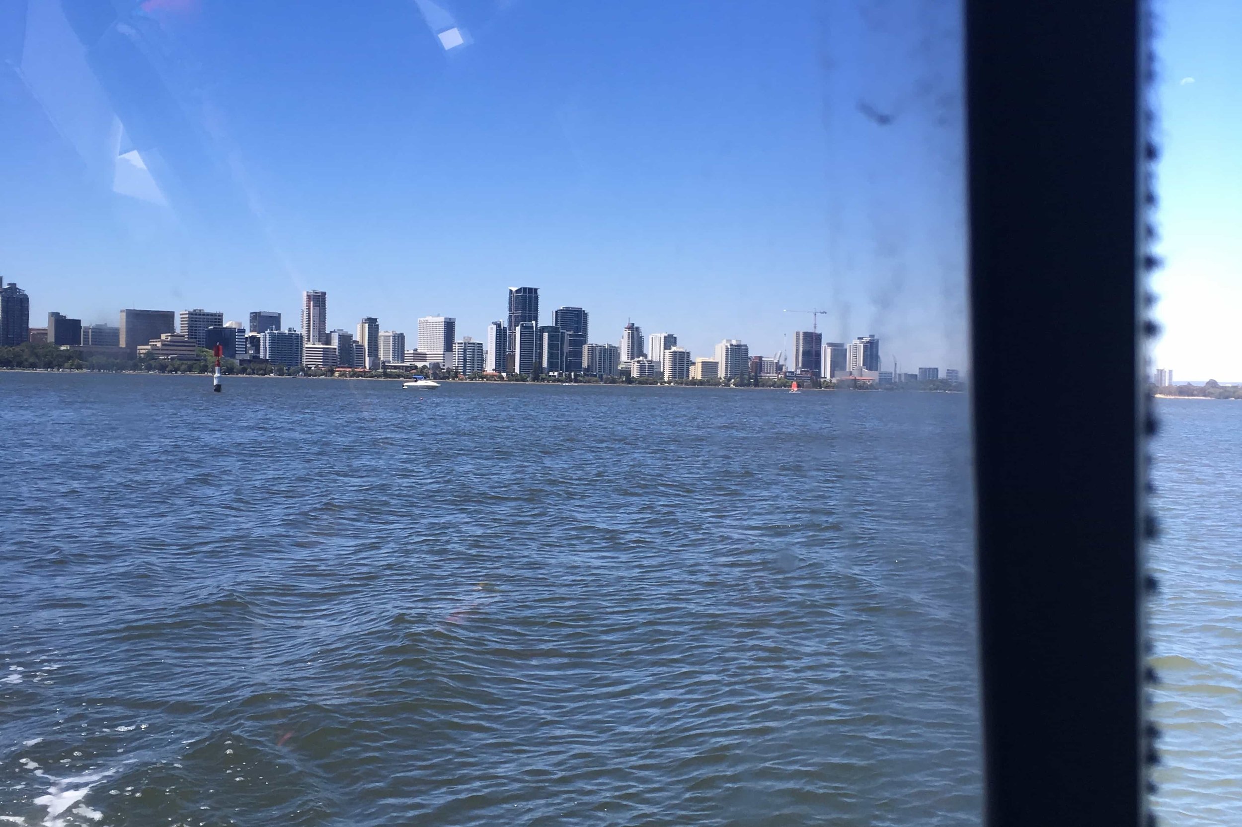 view of modern buildings in perth on the water
