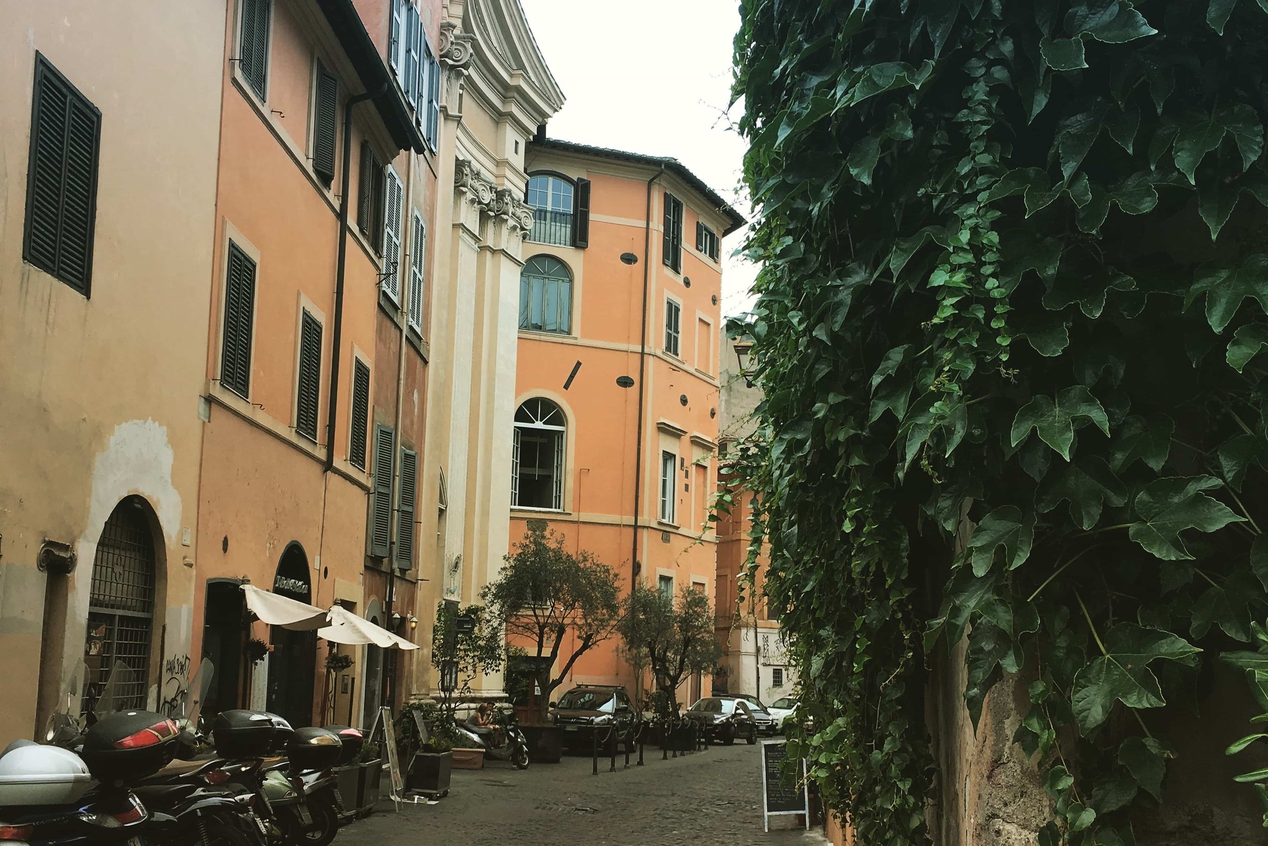 colorful street rome orange homes