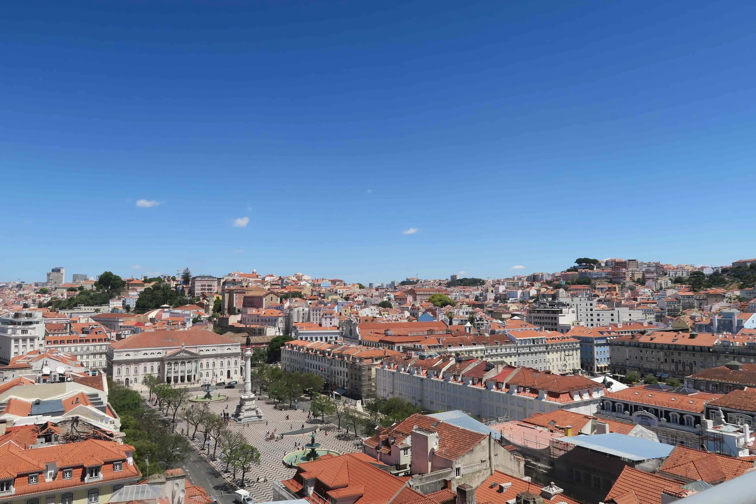 orange rooftops and blue skies