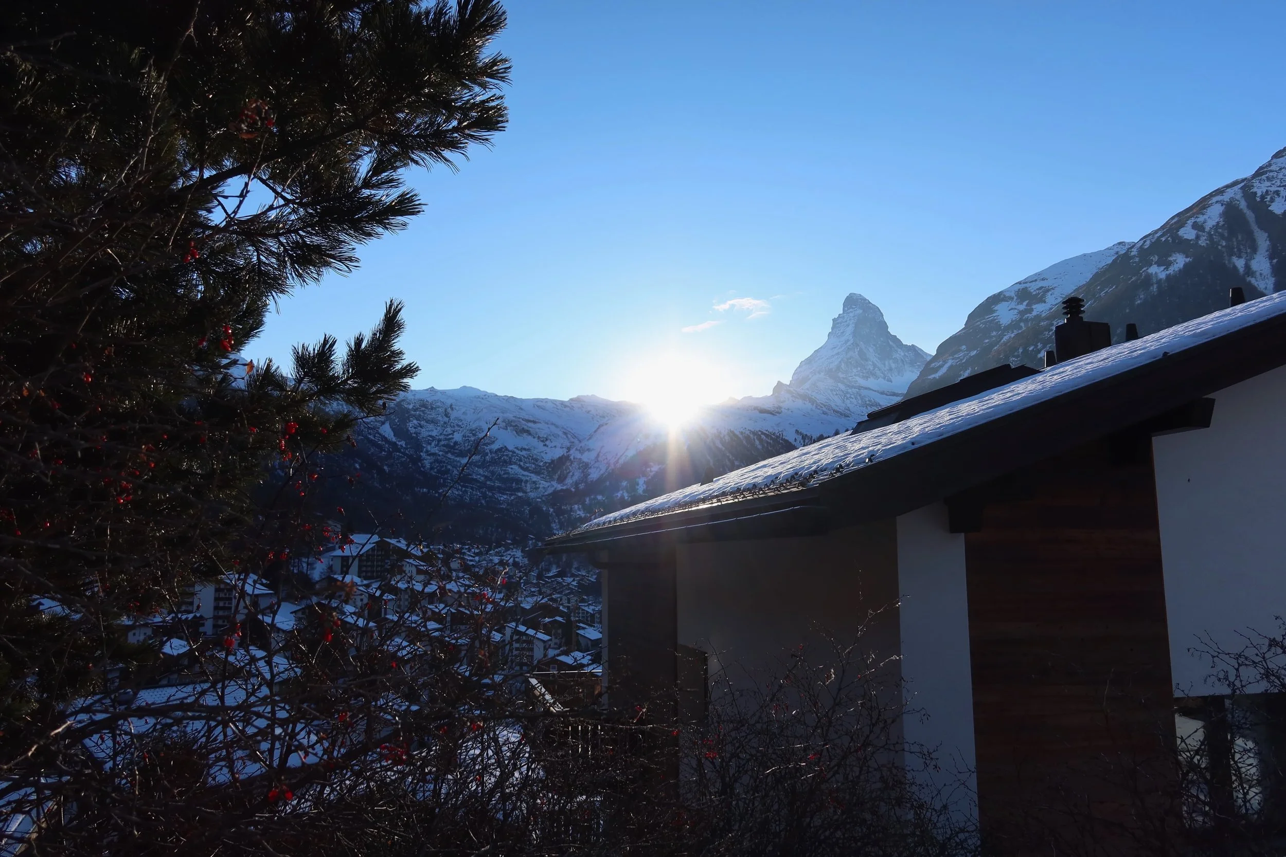 Matterhorn hiding behinds roofs in Zermatt;