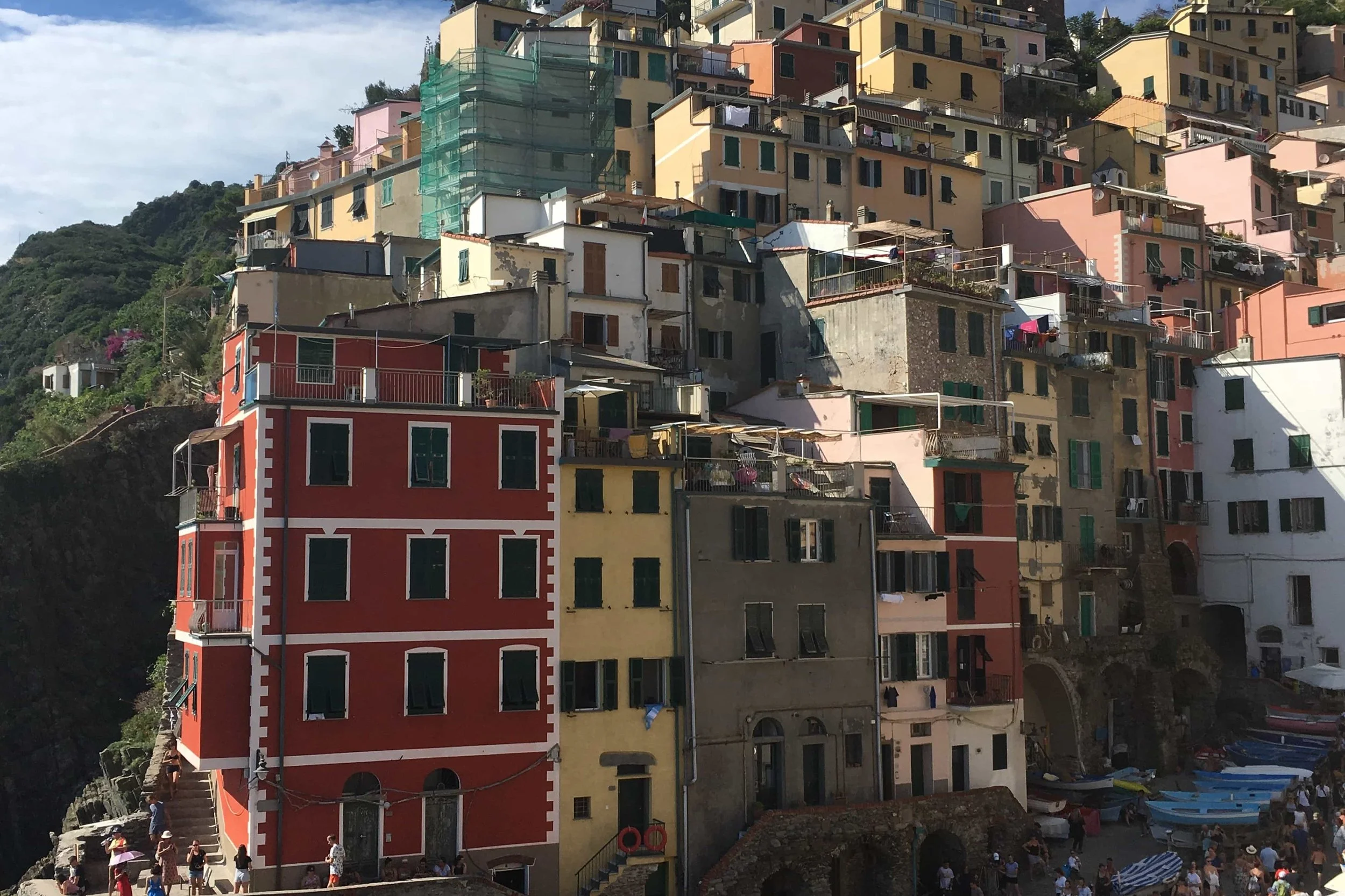 red and yellow buildings on a hill