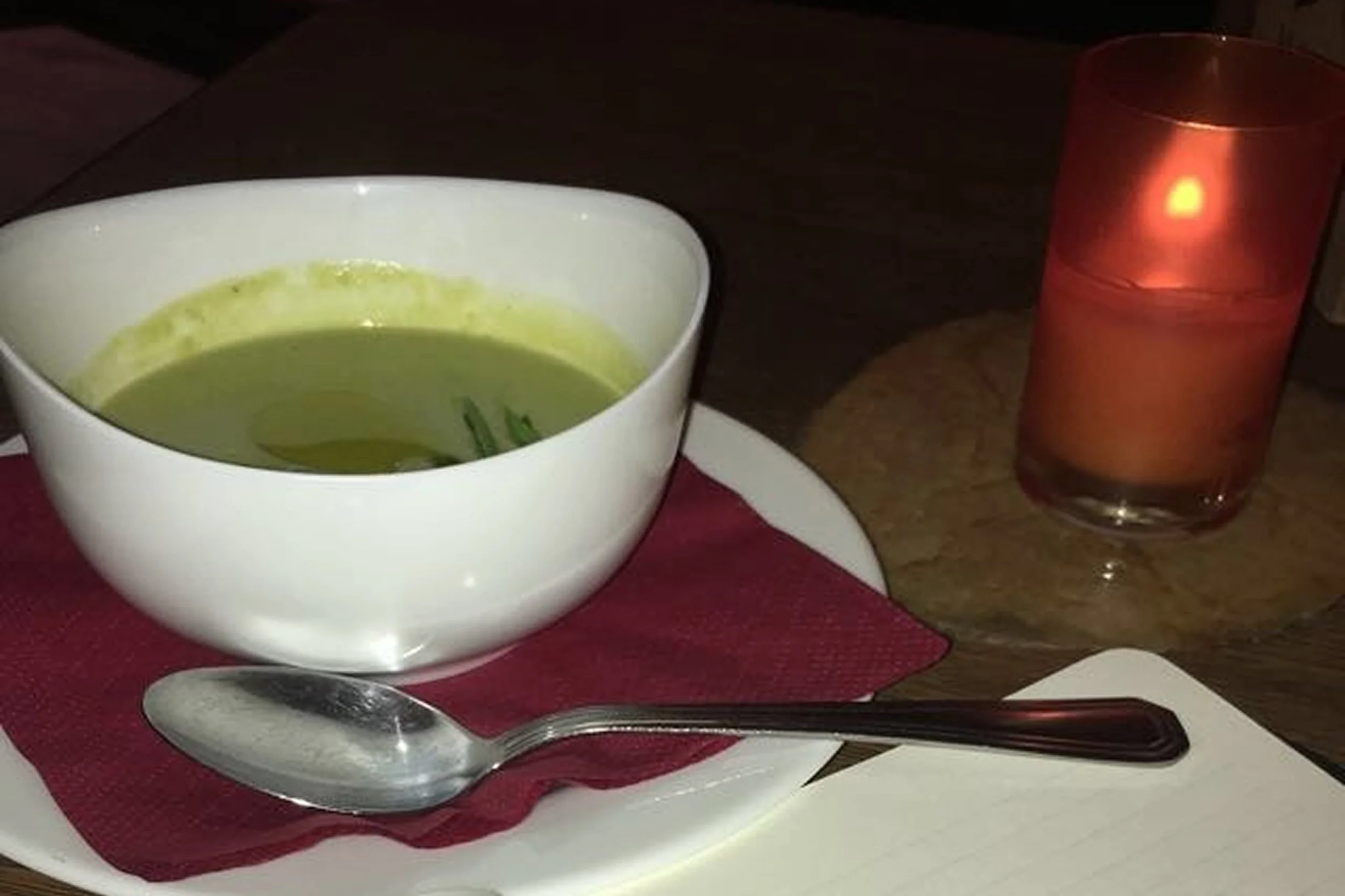 green soup and candle