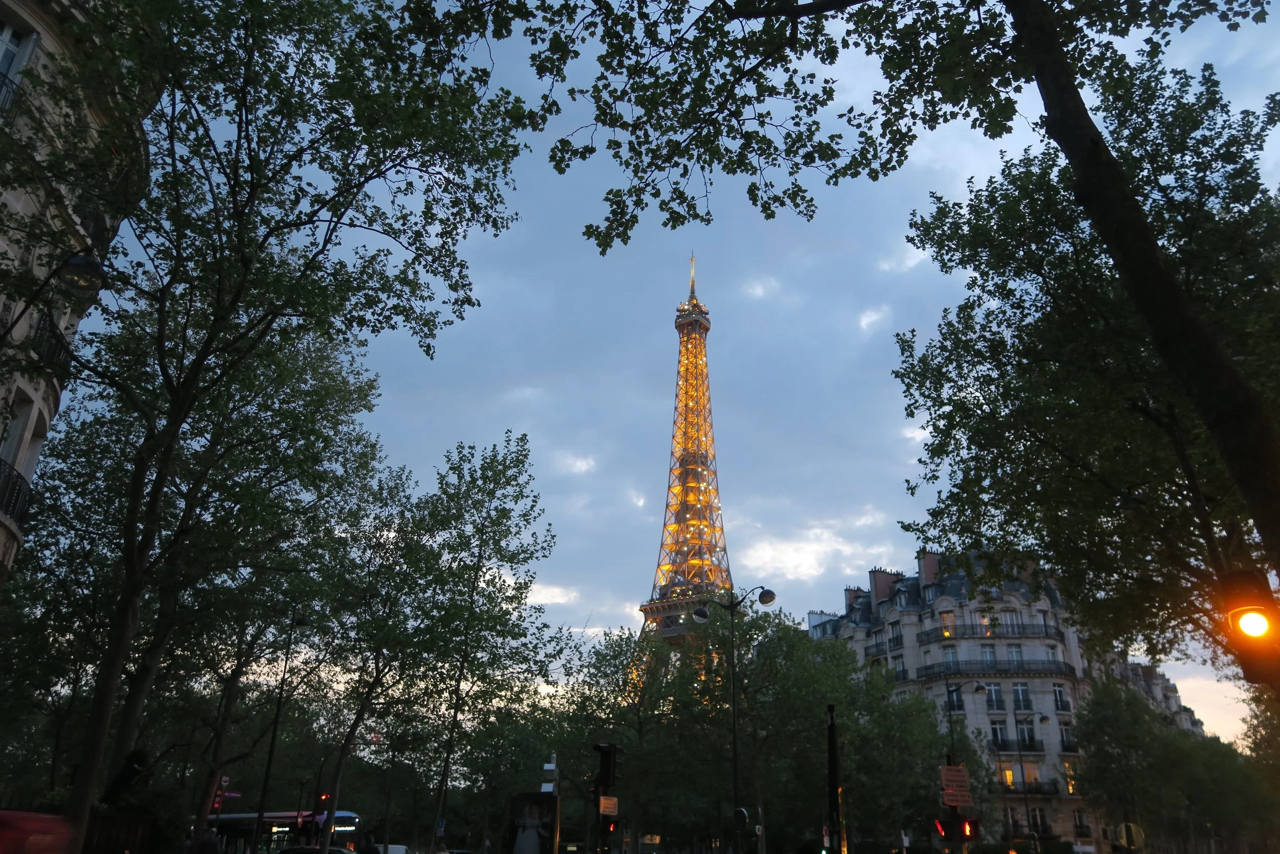 Eiffel Tower sparkling at night during the summer month
