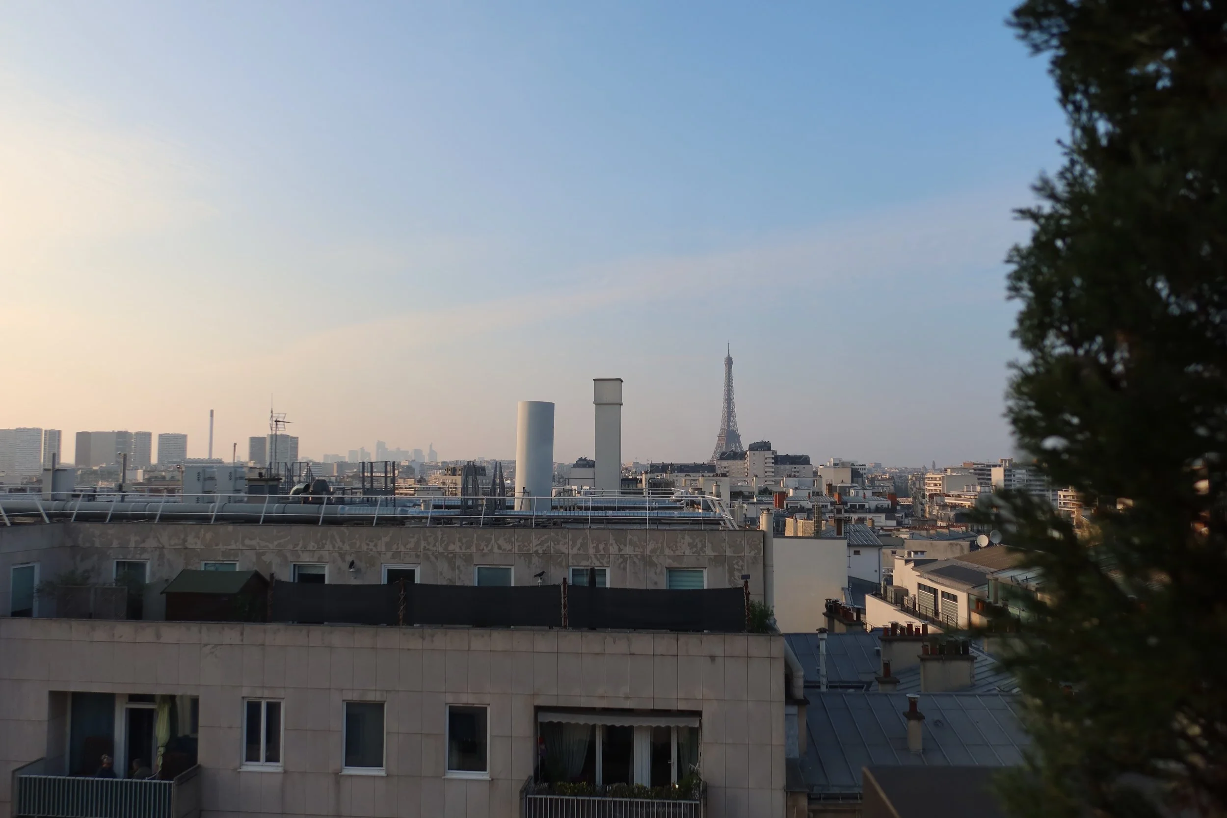 novolo hotel rooftop bar view buildings and eiffel tower