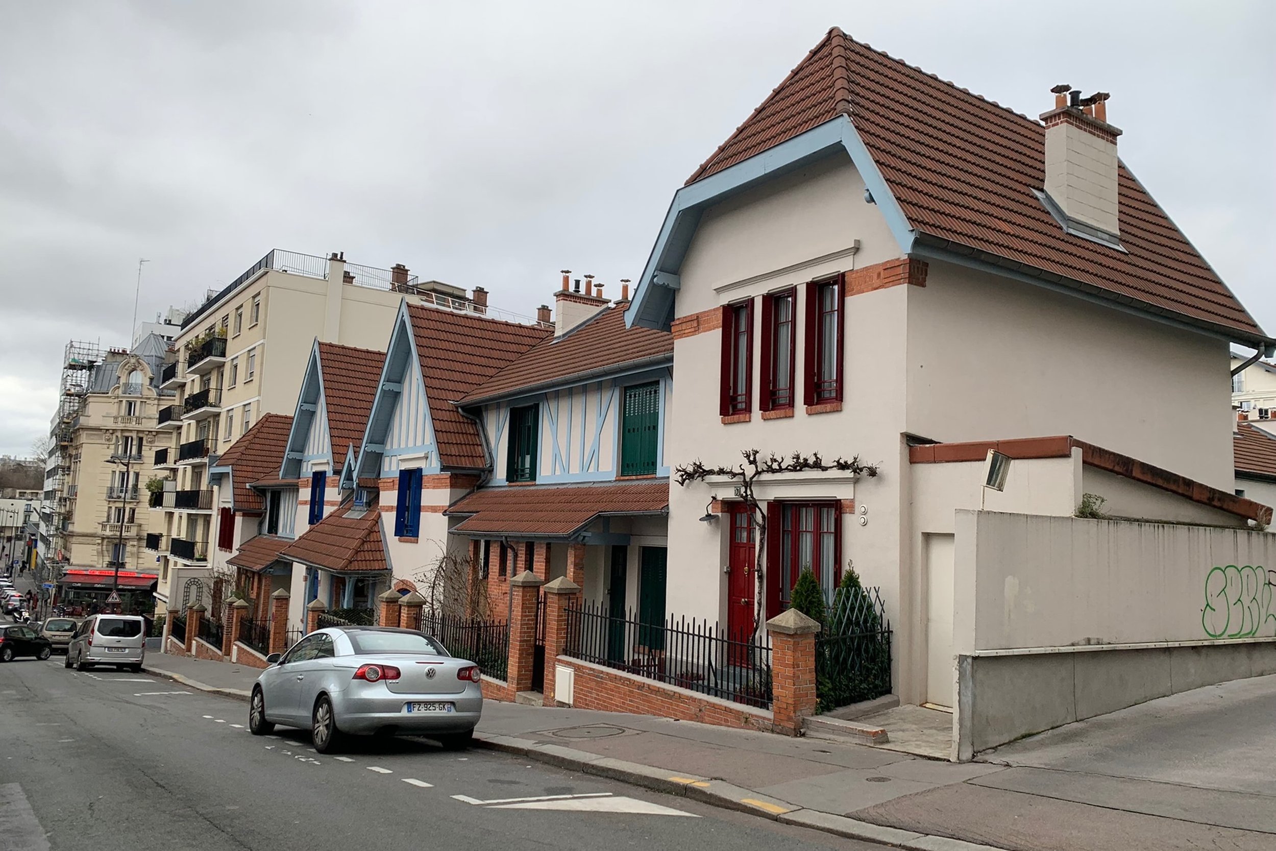 german style homes in paris neighborhood on hill