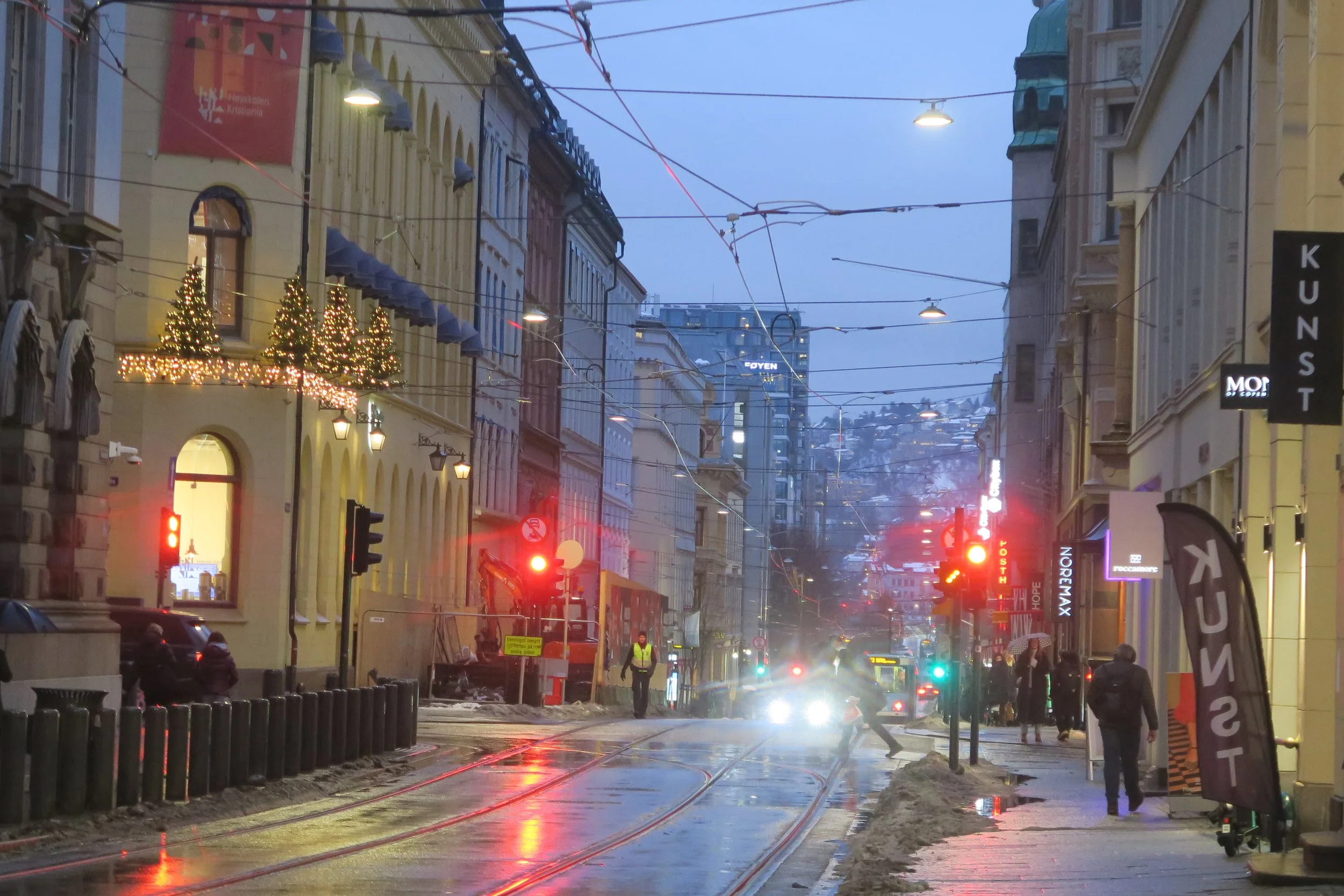 dusk view of lit up street in oslo