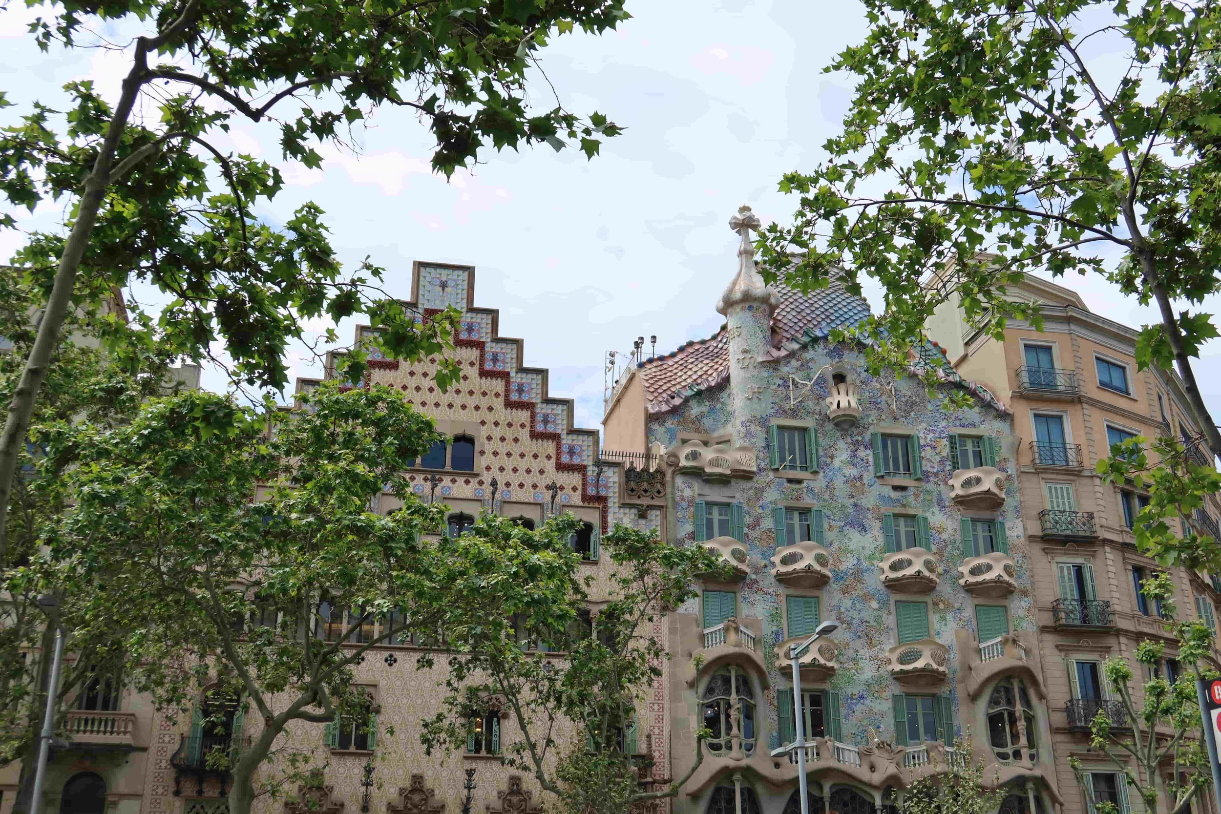casa batllo barcelona street view blue and floral gaudi architecture