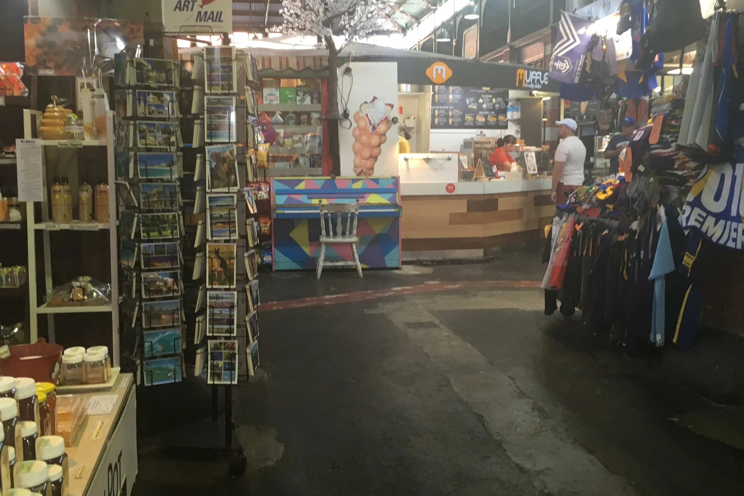 market with postcards coffee food and more