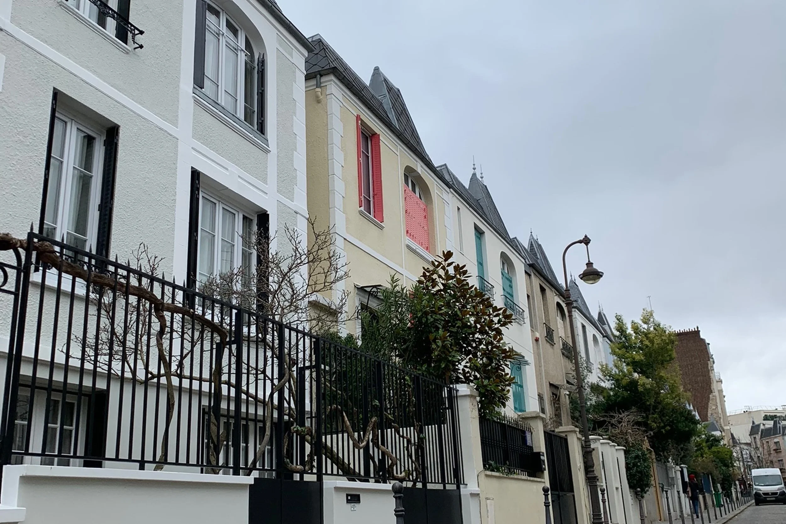 notting hill like street in paris with colored homes close together
