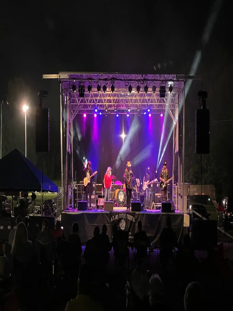 Live concert stage with professional sound reinforcement by Hunt The Sound