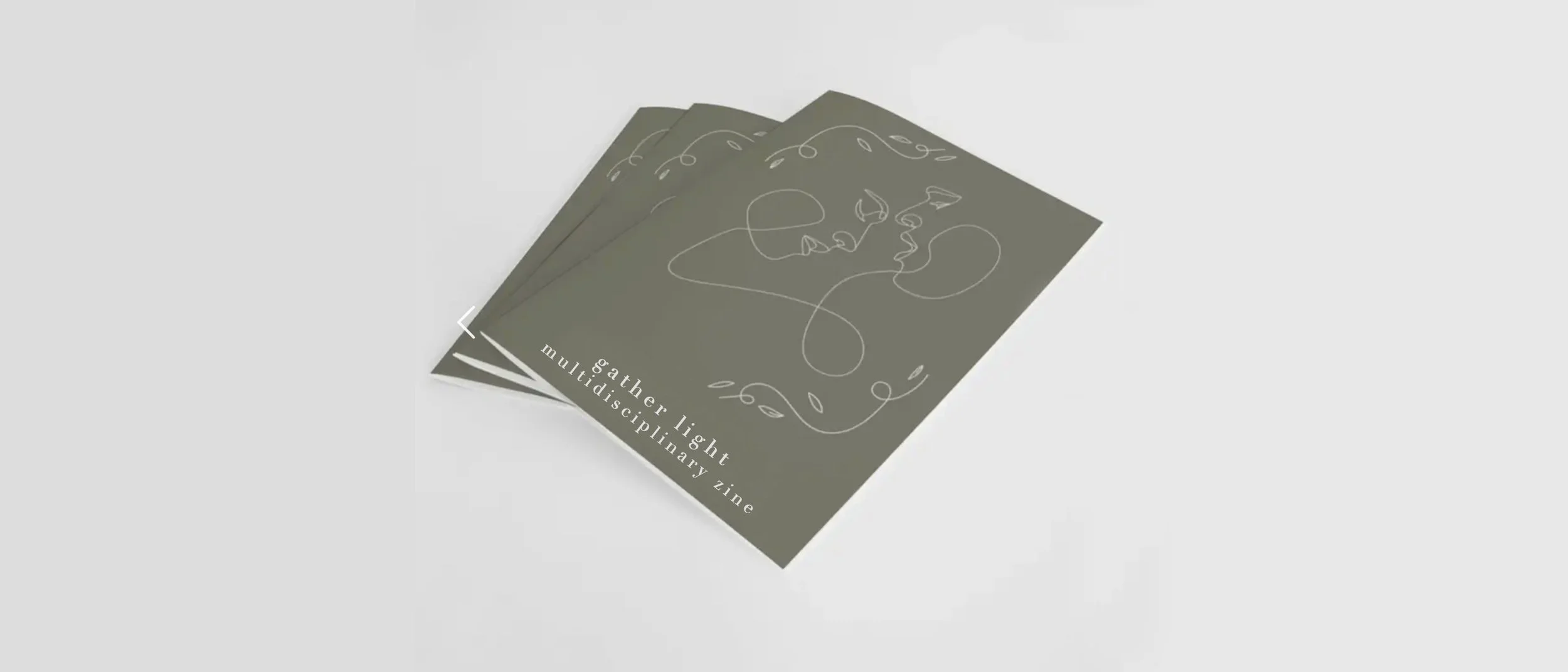 Artwork Magazines with Gather Light and swirly portrait of two faces in profile on gray background