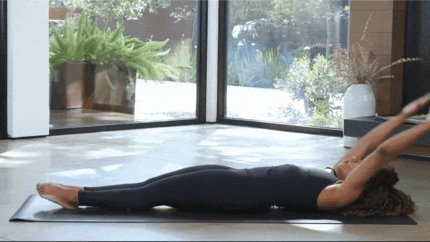 Pilates Roll Up Exercise: How to do a Pilates Roll Up + Benefits and  Progression