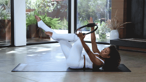 Woman-Doing-Twist-And-Stretch