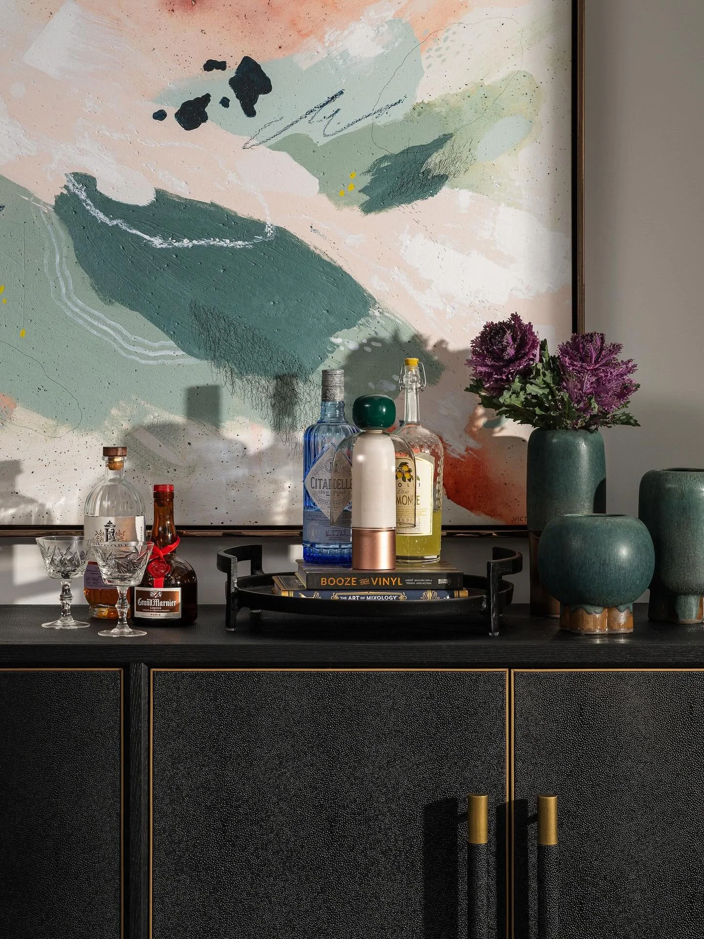 Color, but make it calm.
&zwnj;
This living room was all about balance &mdash; depth without heaviness, warmth without clutter.
We played with moody teals, terracotta, and soft neutrals, layering each tone to create quiet contrast.
The result? A spac