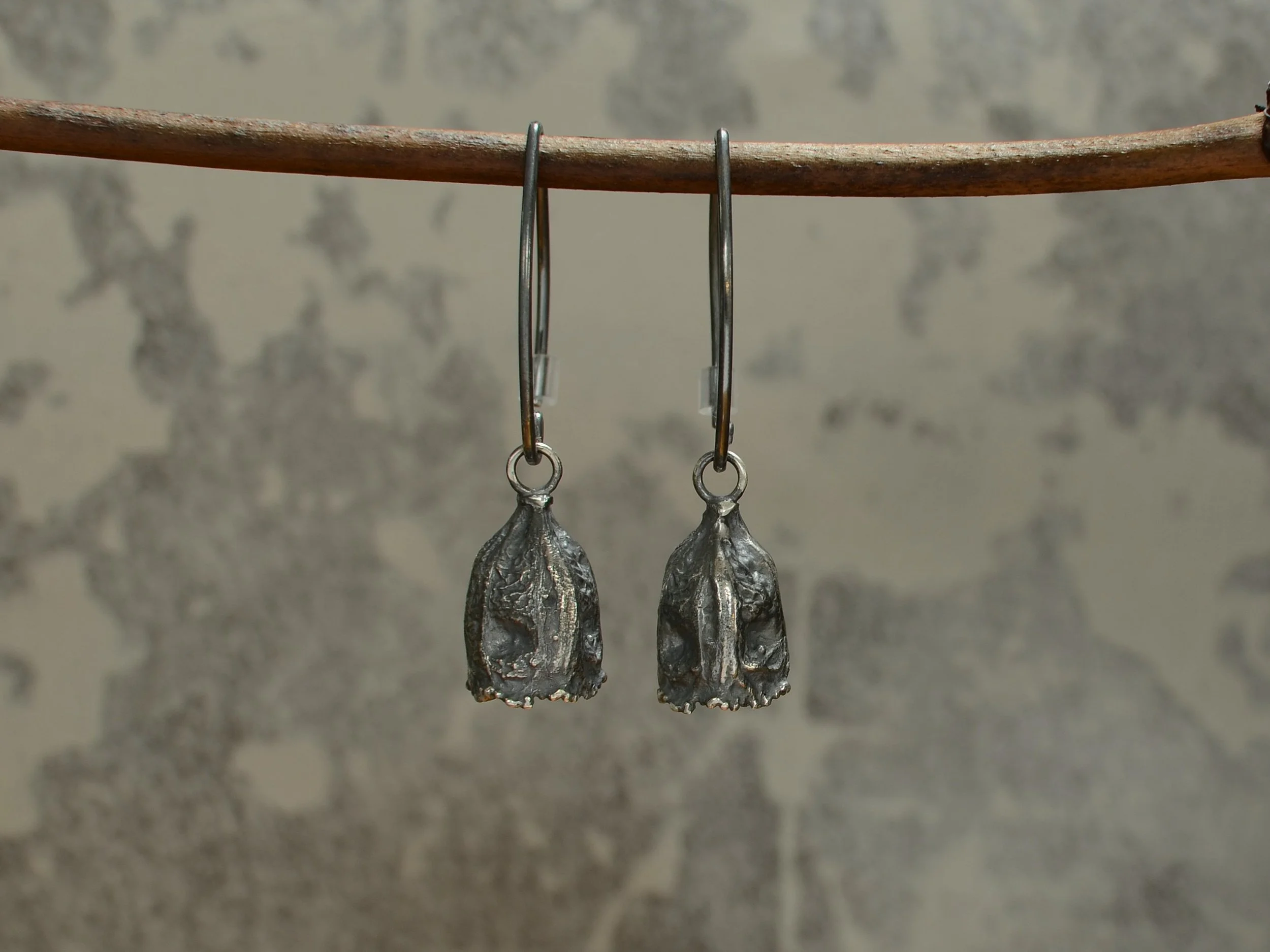 Husk drop earring