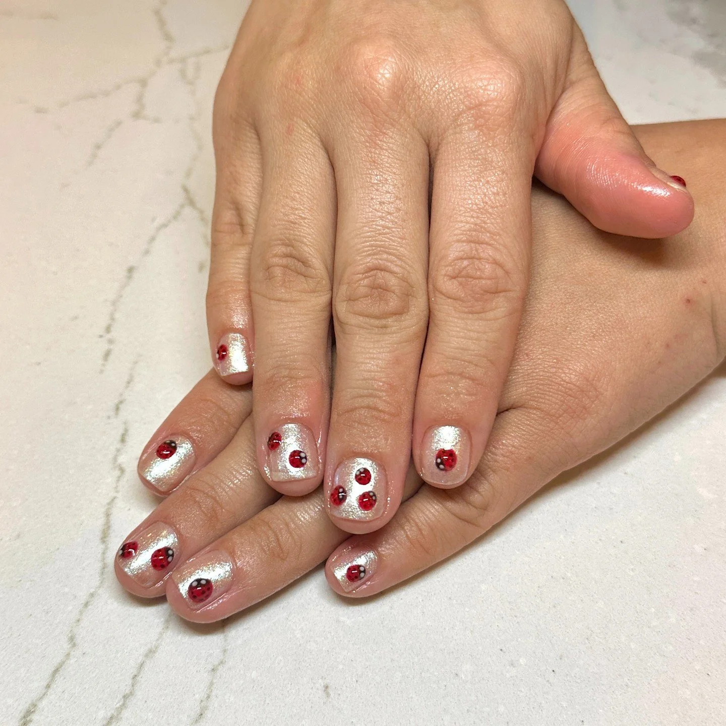 "Ladies, we're bugging out over these nails! 🐞 Fly by and get the perfect set to match your summer vibe.