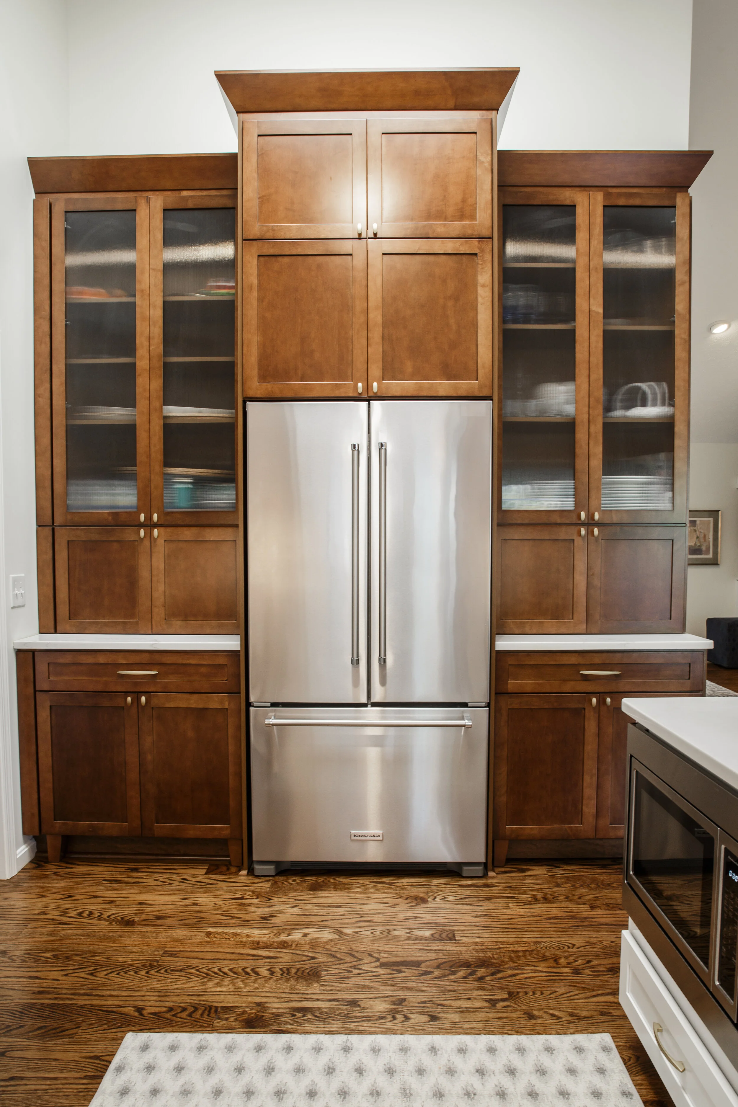 This wall was created for much needed storage &amp; flexibility and to add more task area in counter top space.