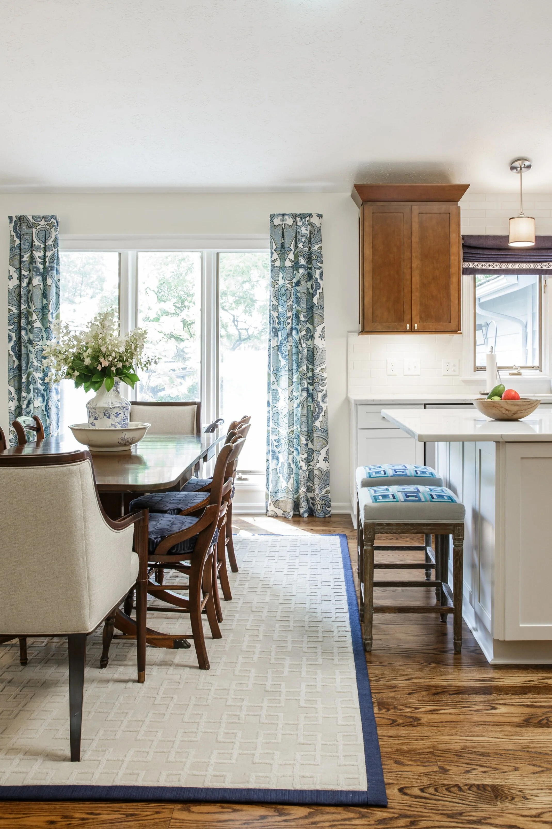 Removing the wall immediately let more natural light in the kitchen area and improved the flow throughout the main floor.