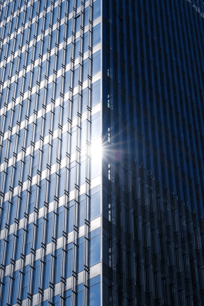 Commercial office building in Monroeville PA with large windows requiring solar shade solutions