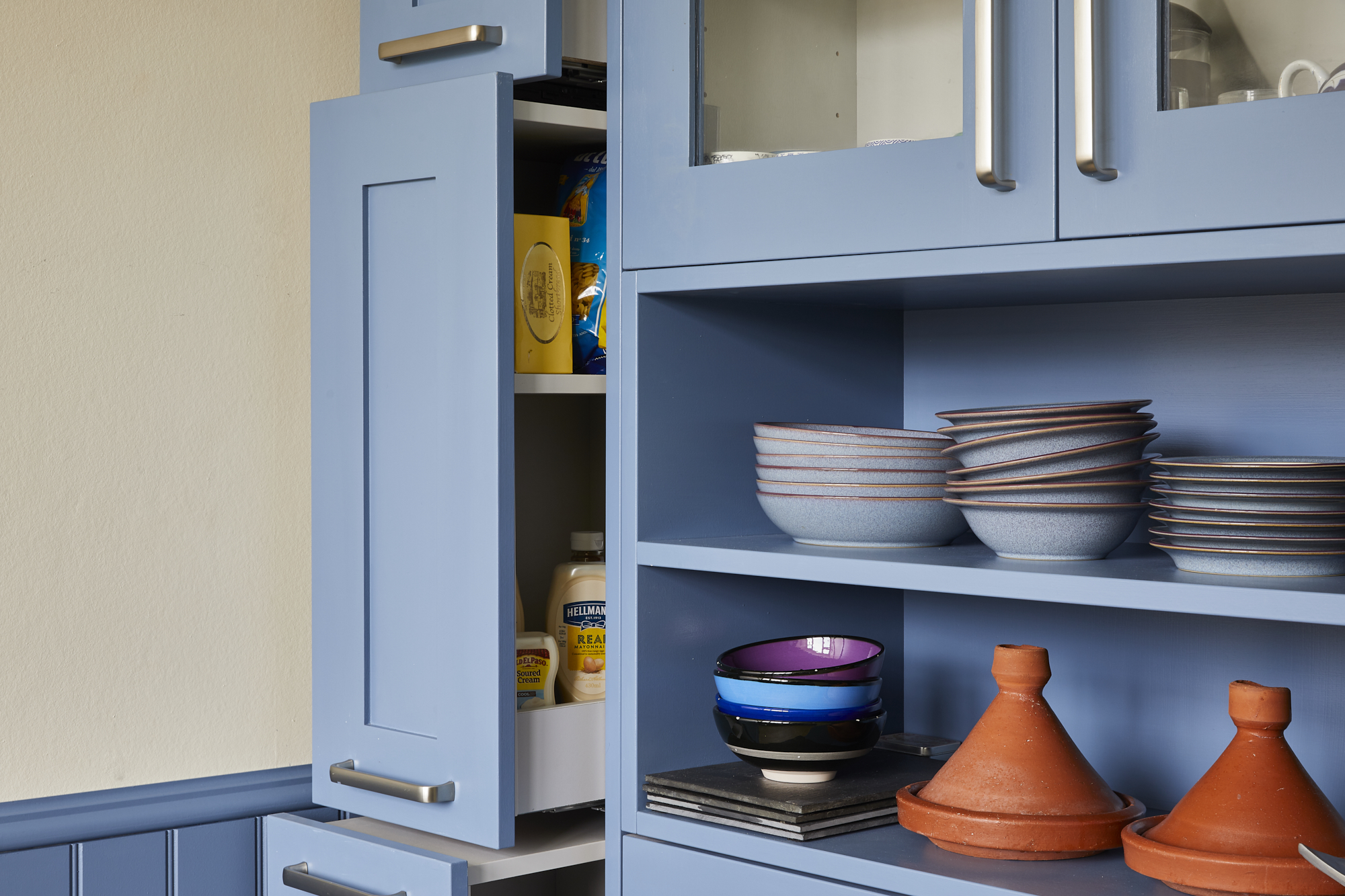 Bespoke pull-out larder shelving made according to customers' specific requirements