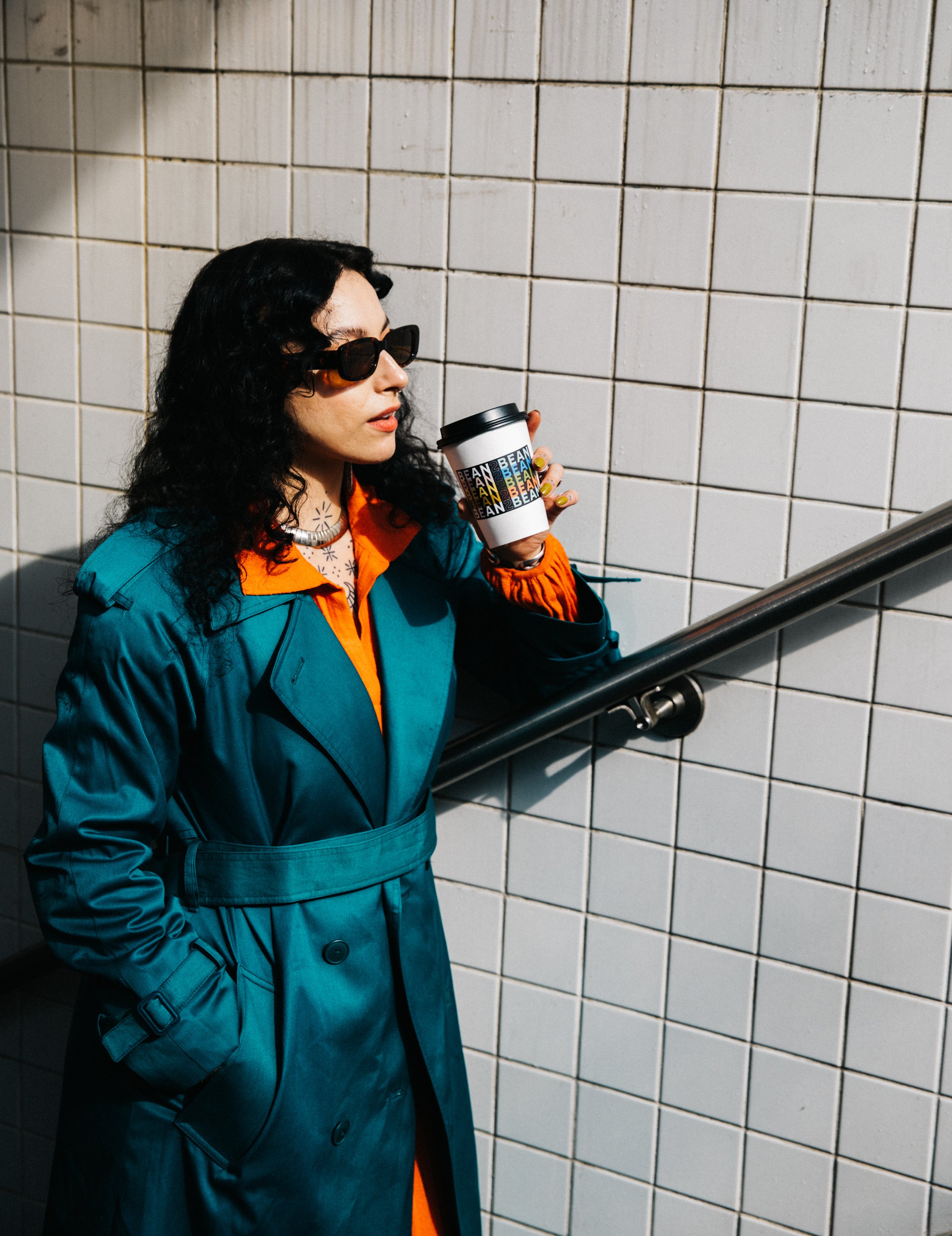 Drinking Bean2Bean Coffee on the Subway Stairs in NYC, Photo by Corey Jermaine
