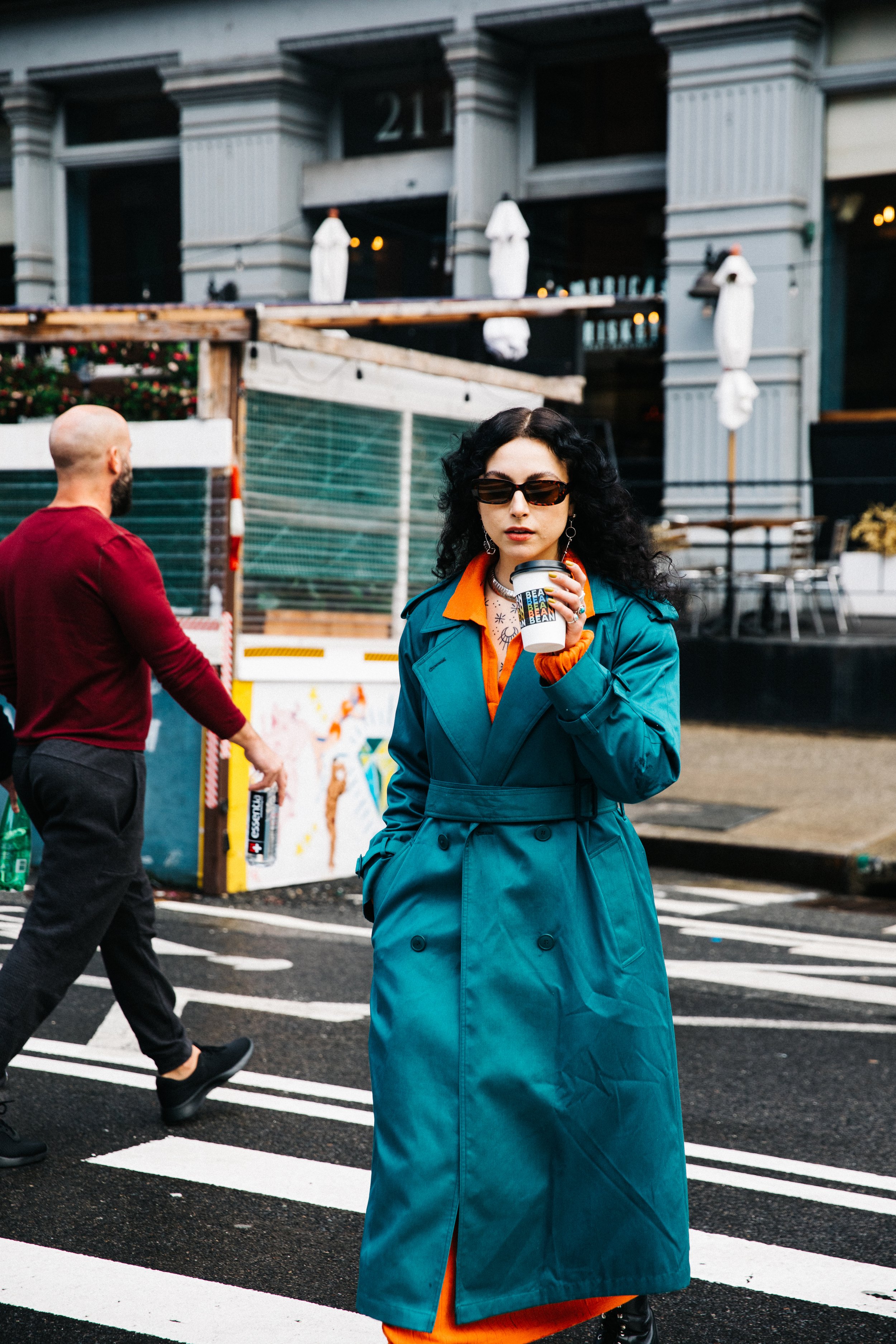 Walking in the Street in NYC Drinking Bean2Bean Coffee, Photo by Corey Jermaine