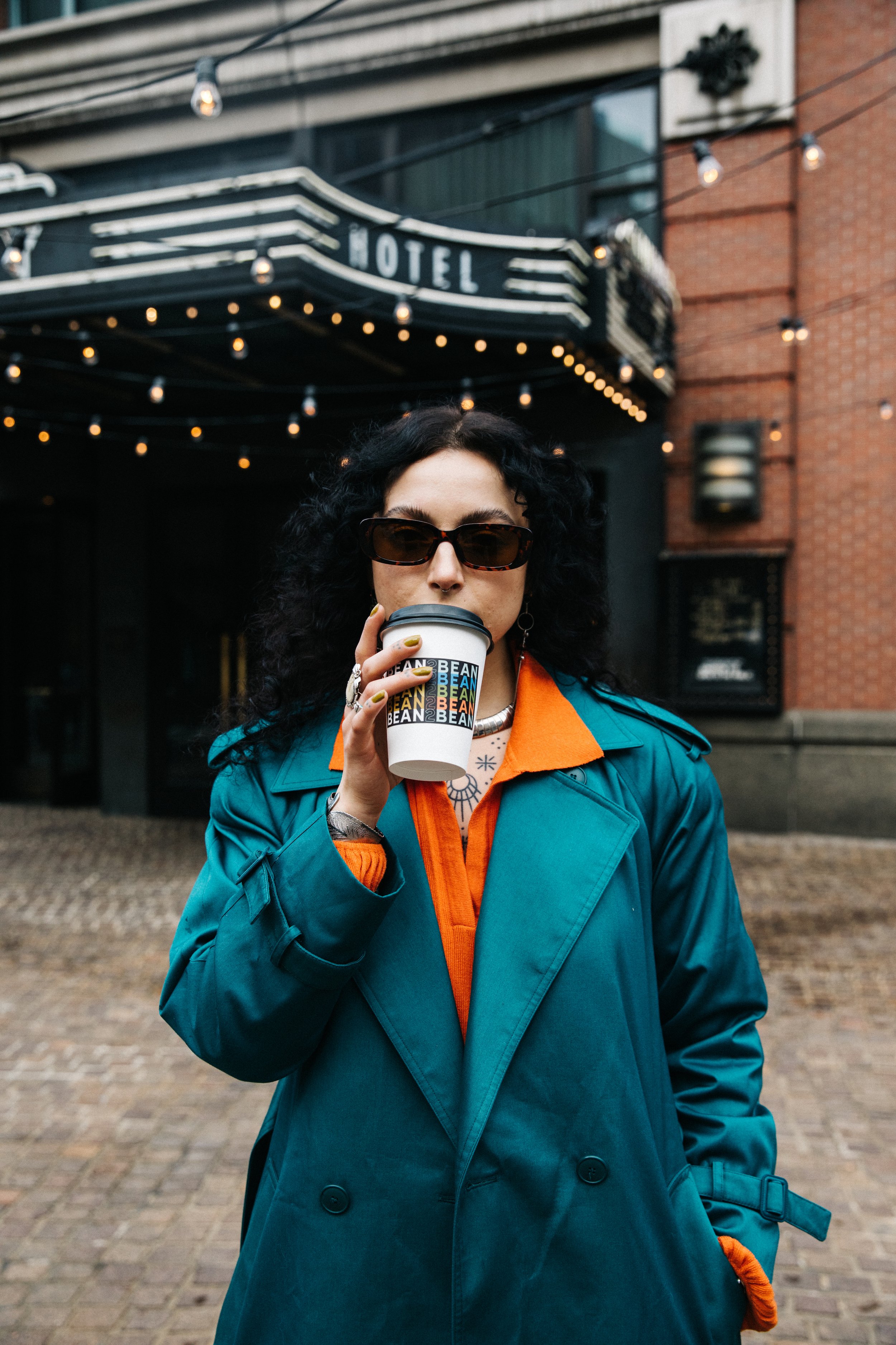 Drinking Bean2Bean Coffee Outside the Roxy Hotel in NYC, Photo by Corey Jermaine