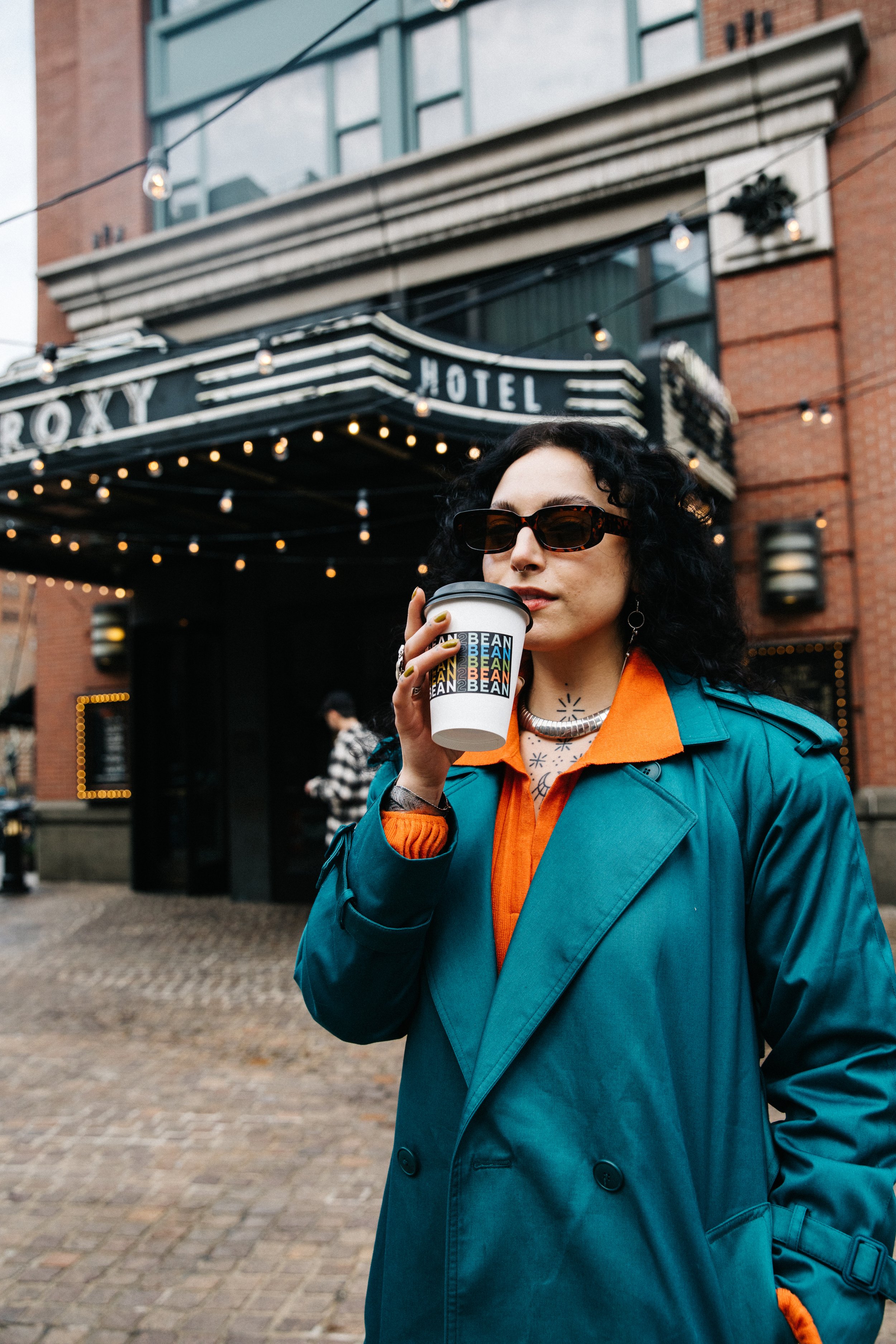 Drinking Bean2Bean Coffee Outside the Roxy Hotel in NYC, Photo by Corey Jermaine