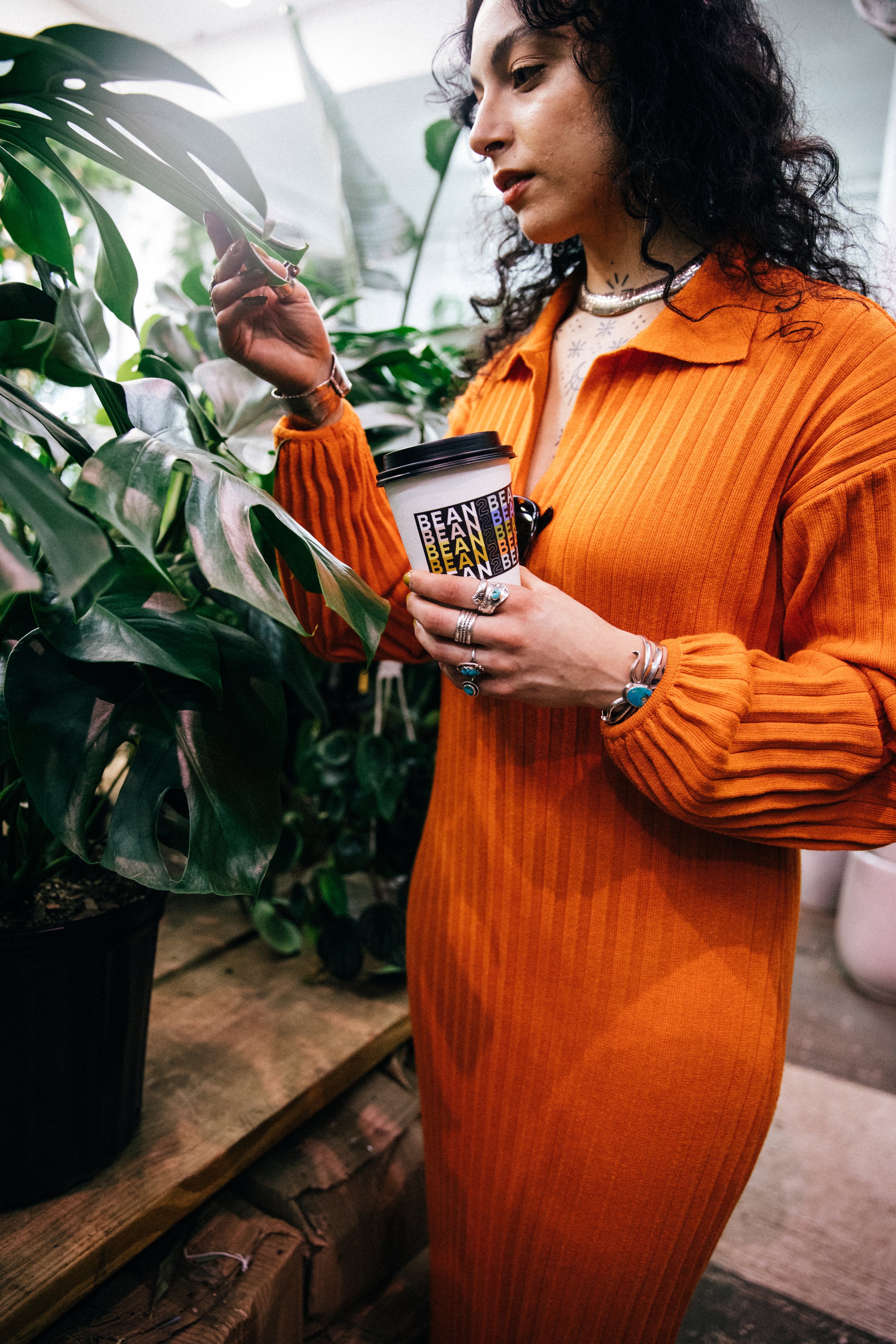 Admiring Plants with Bean2Bean Coffee, Photo by Corey Jermaine