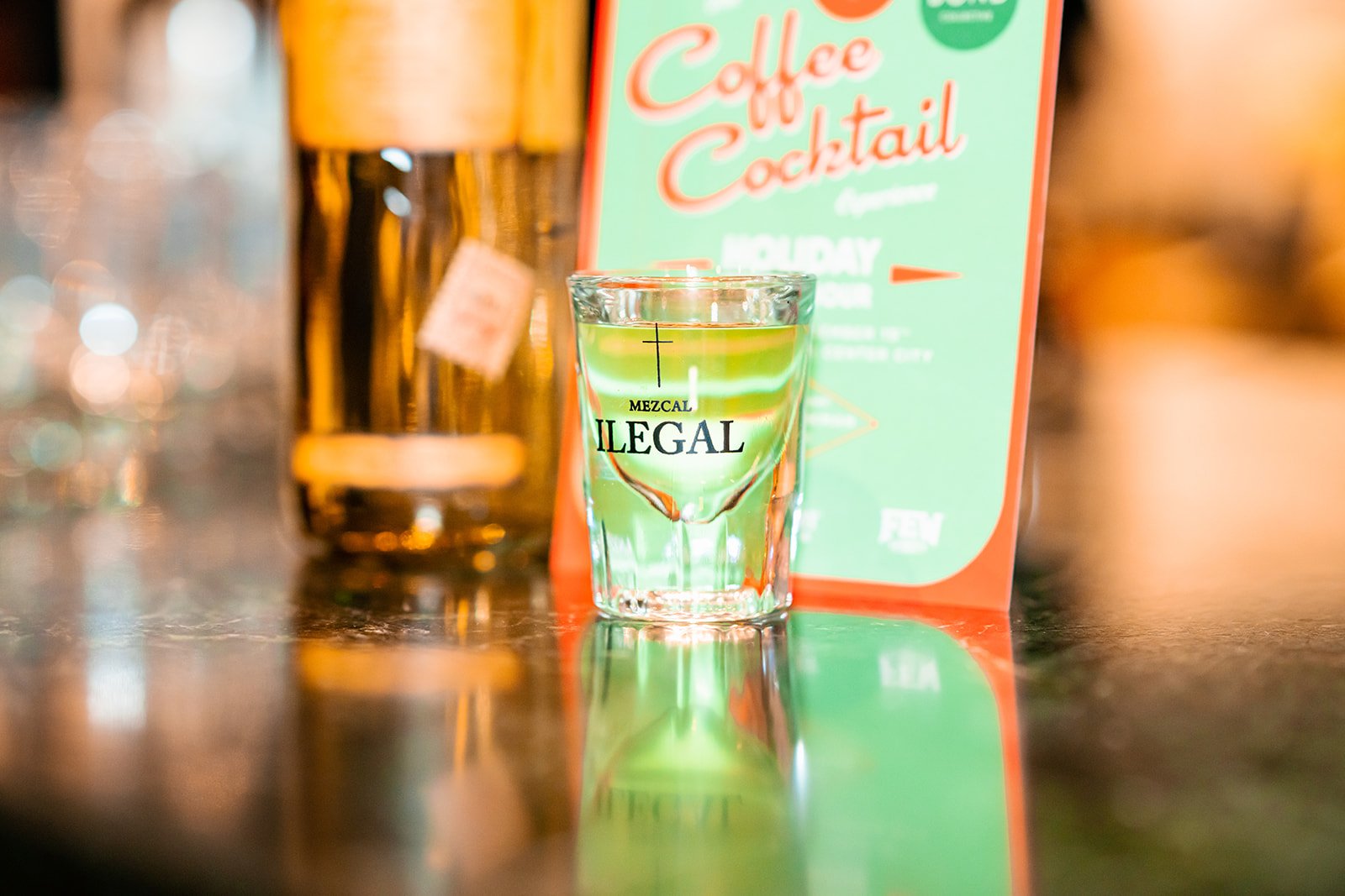 ilegal mezcal and sign at Bond Collective Center City event for Bean2Bean Coffee Co photo by Daniel Knoll