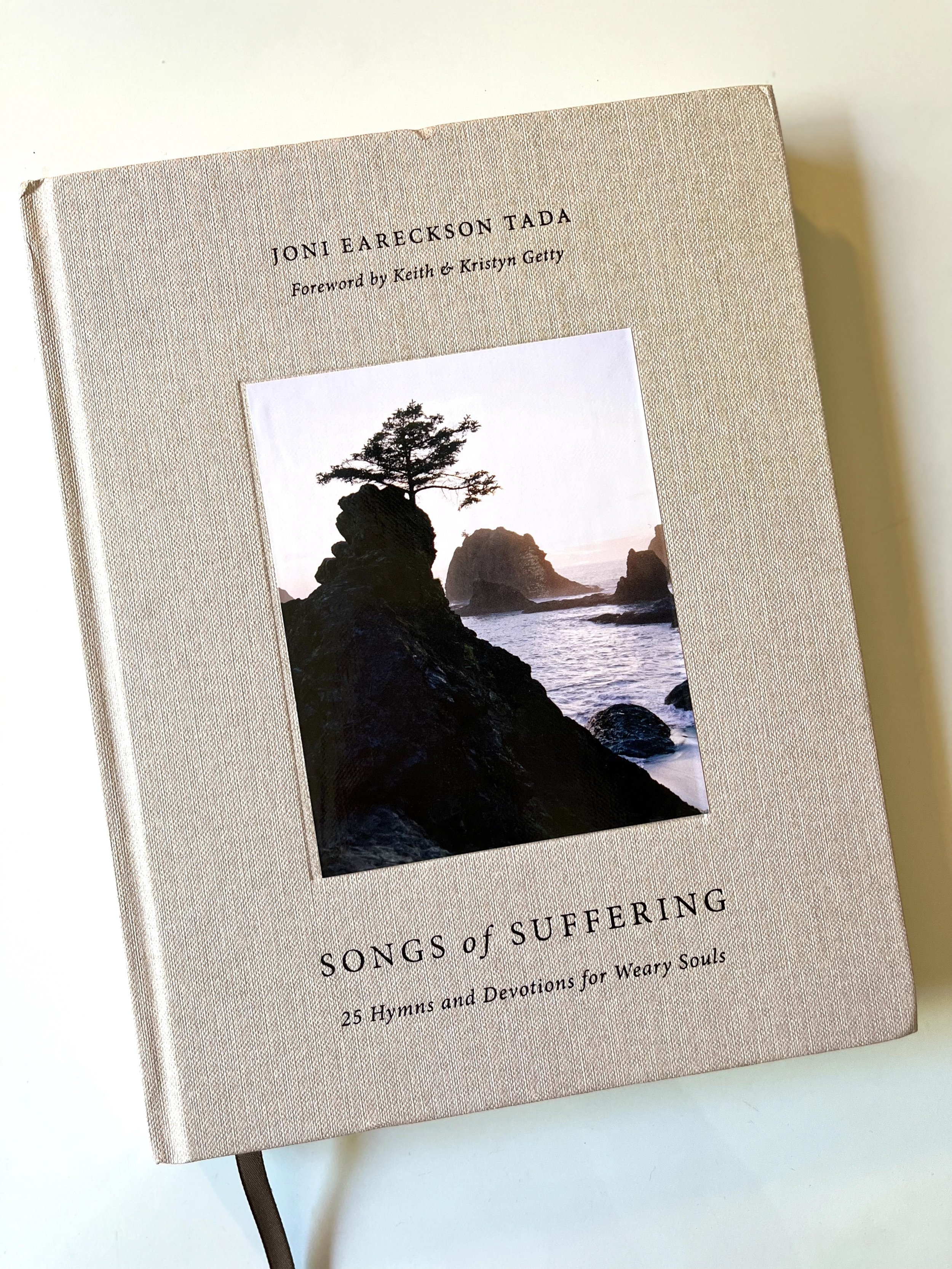 Book Review: Songs of Suffering